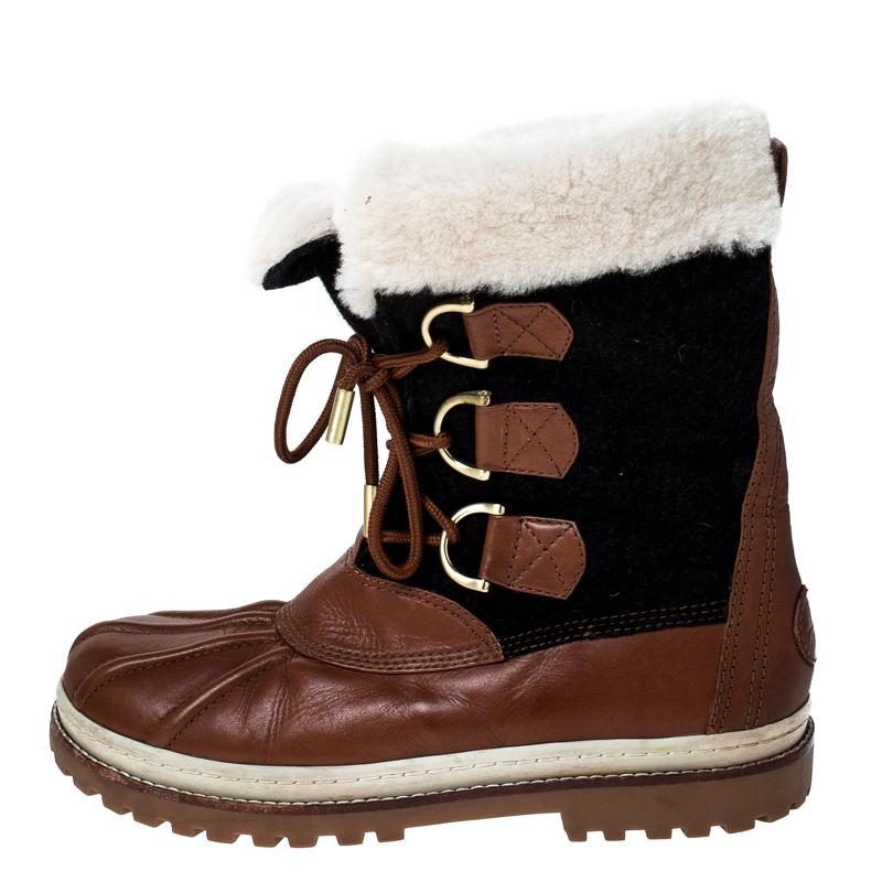 

Tory Burch Brown Leather Shearling Lined High Top Boots Size