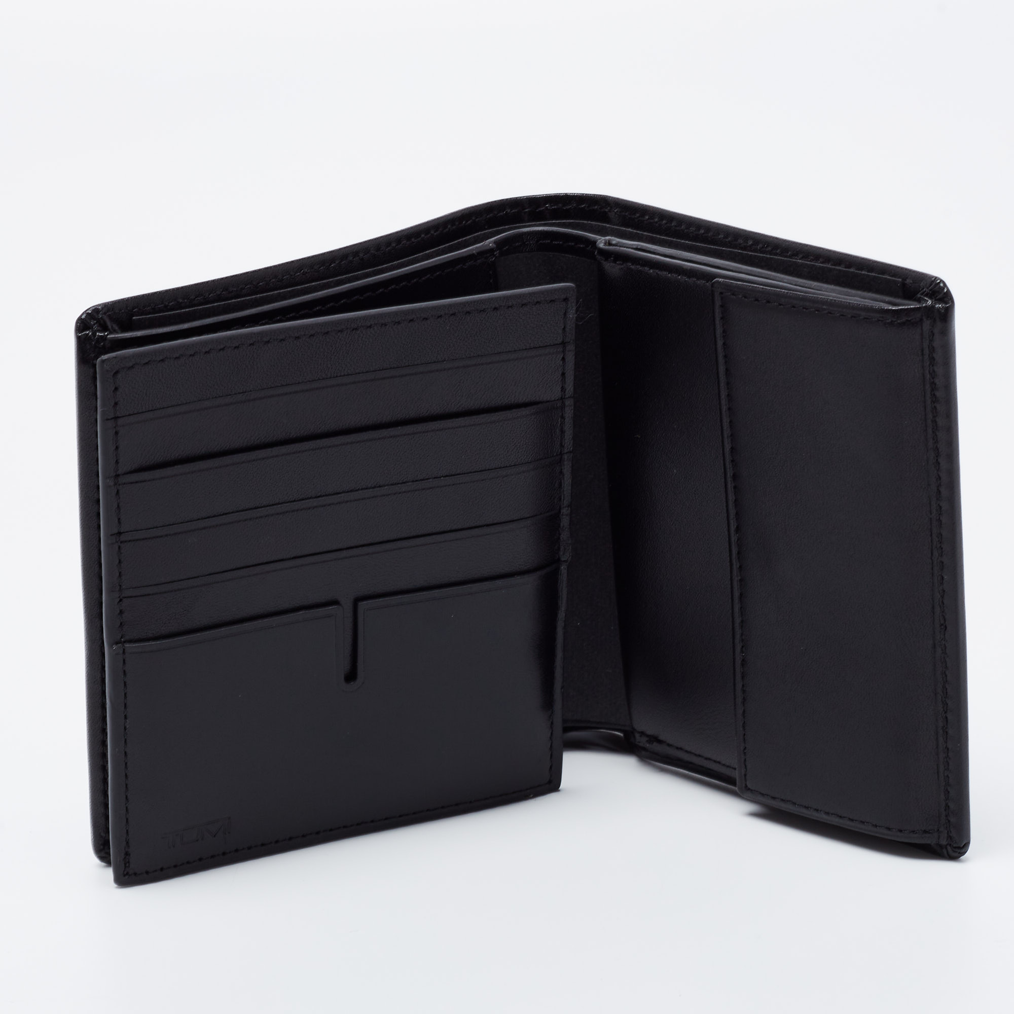 

Tumi Black Leather Global Vertical Flip Coin Wallet