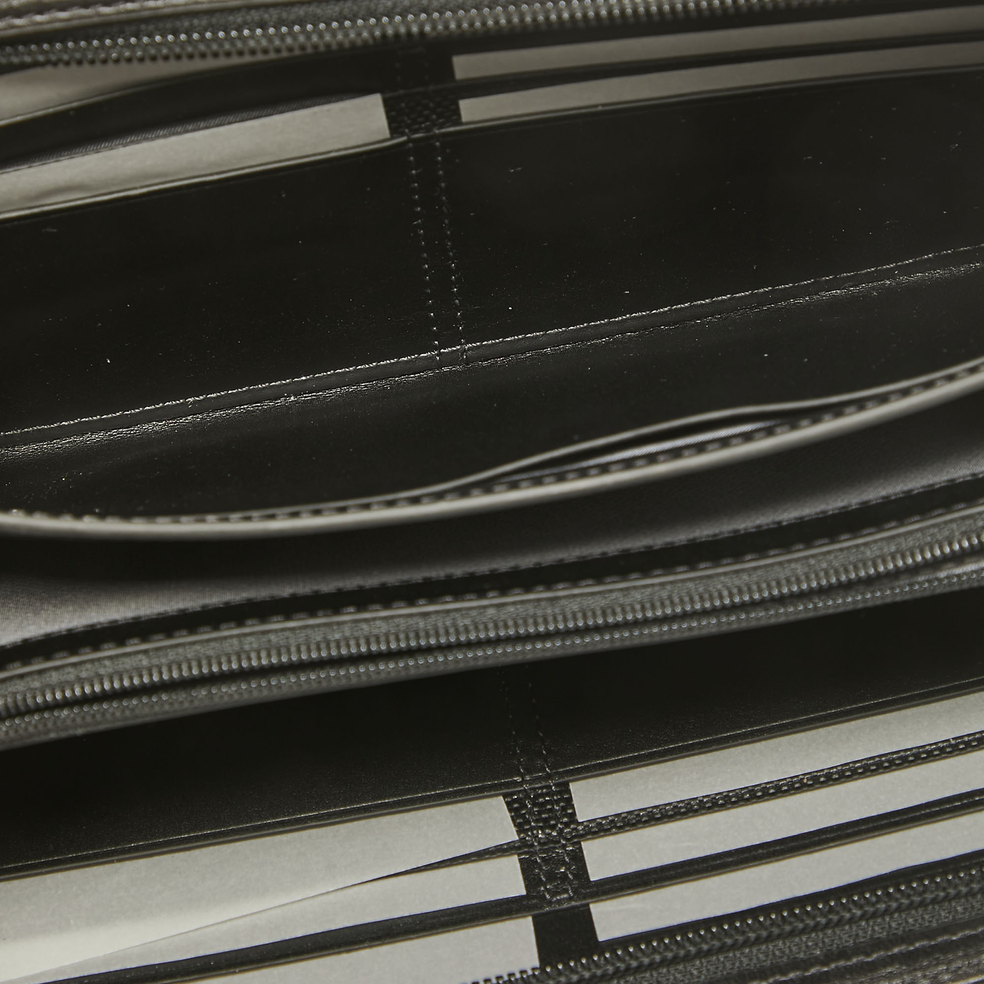 

Tumi Black Nylon and Leather Travel Zip Around Wallet
