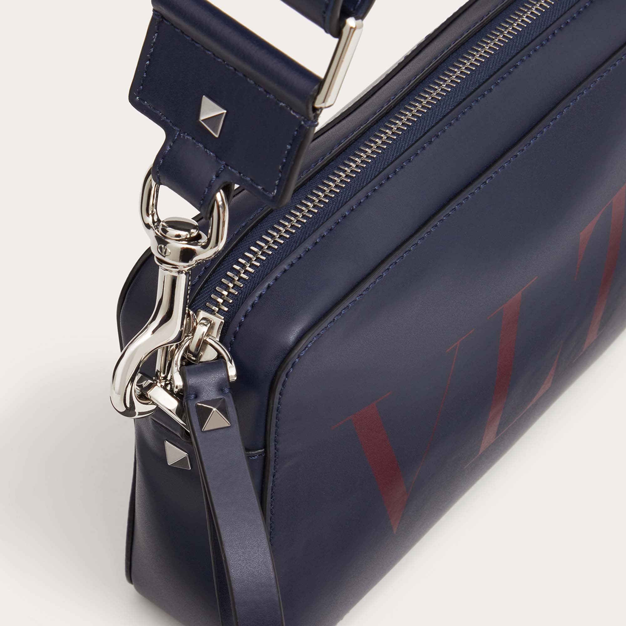 

Valentino Dark Blue/Red Leather VLTN Crossbody Bag, Navy blue