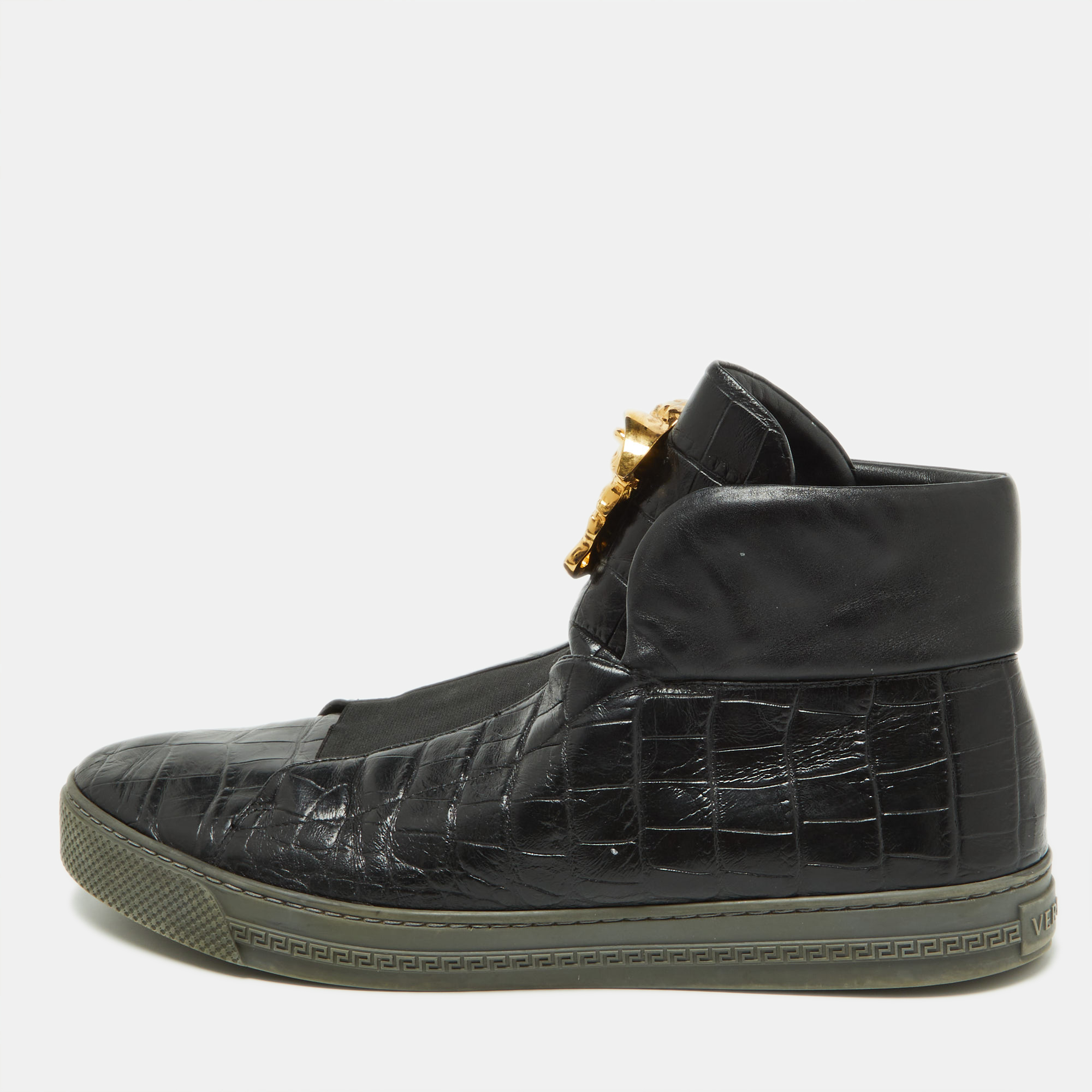 Brimming with fabulous details these Versace sneakers are crafted from croc embossed leather into a high top silhouette and feature the Medusa logo. The fine construction and trendy appeal make these sneakers a must buy.