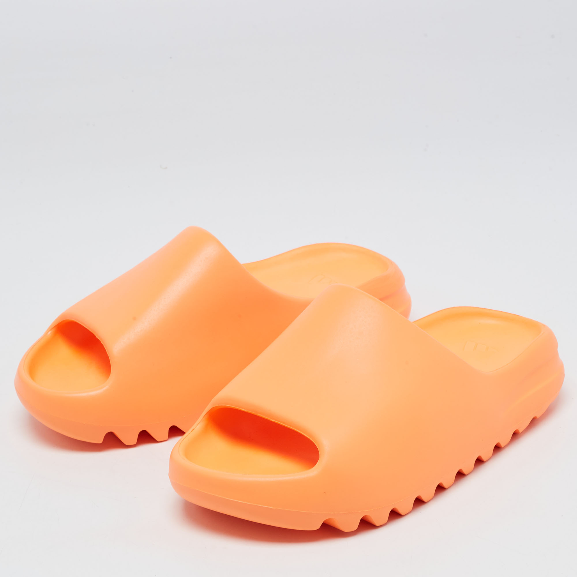 

Yeezy x Adidas Orange Rubber Enflame Slides Size