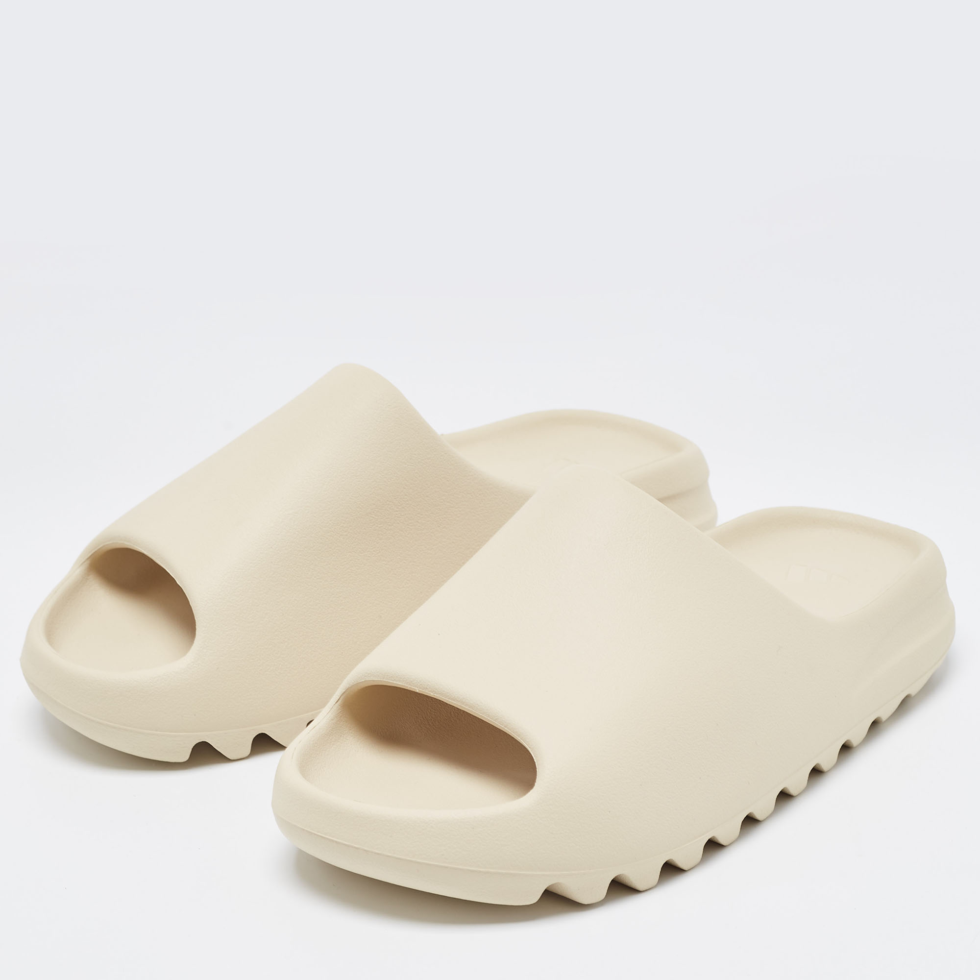 

Yeezy x Adidas Cream Rubber Bone Slides Size