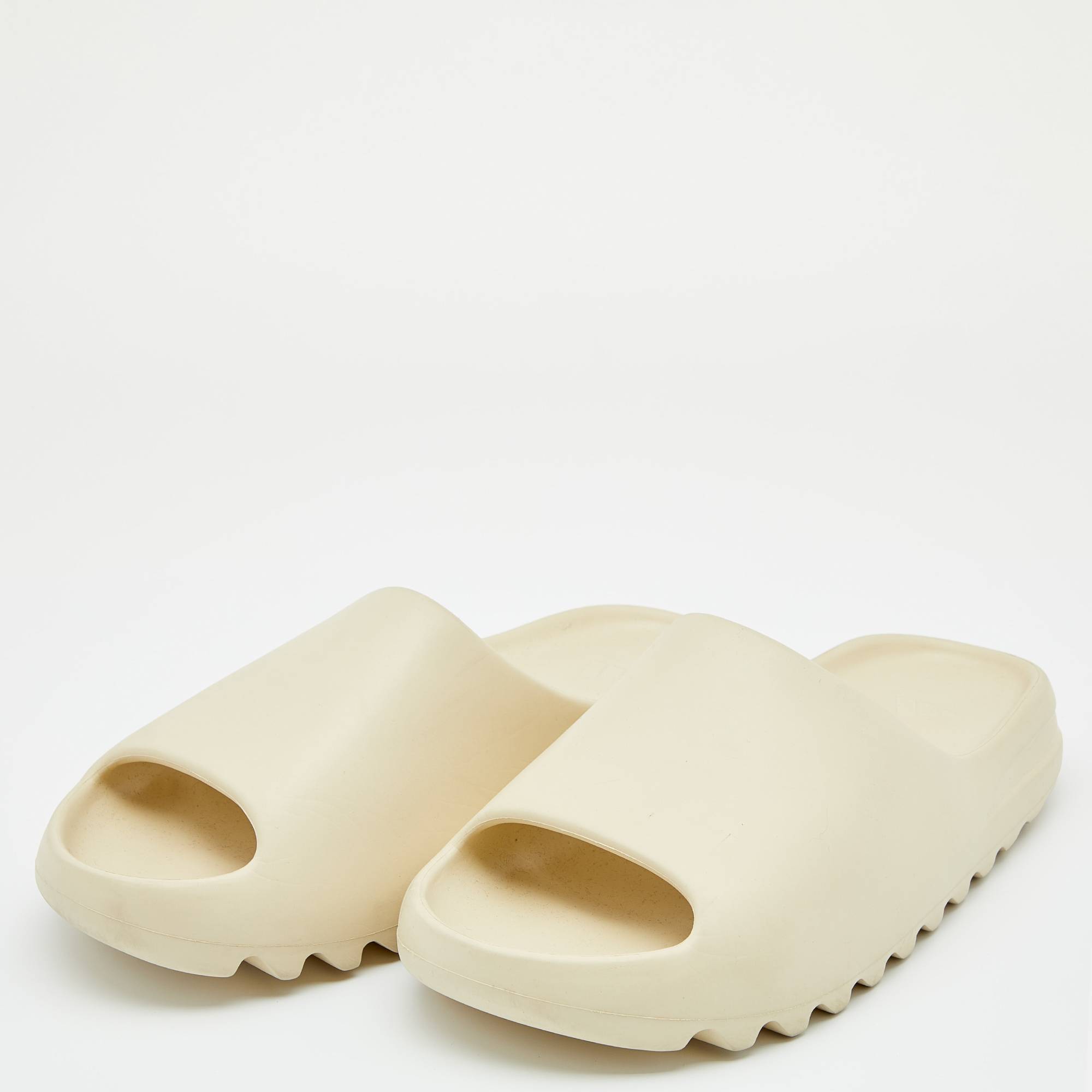 

Yeezy x Adidas Bone Rubber Flat Slides Size, Cream