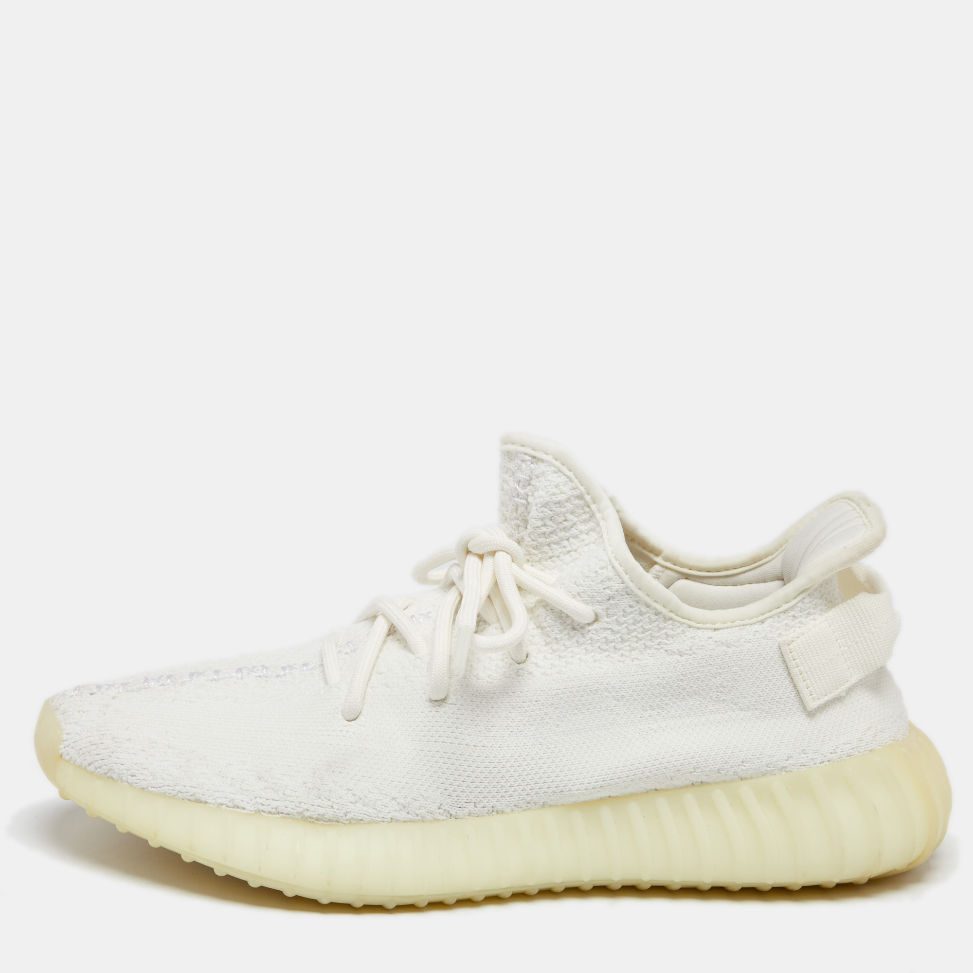Coming from one of the most sought after collaborations Yeezy x Adidas these Boost 350 V2 Triple White sneakers are truly a classic pair to own They are created using cotton knit with a lace up fastening attached to their vamps. Their fabric lined insoles provide great cushioning to your feet.