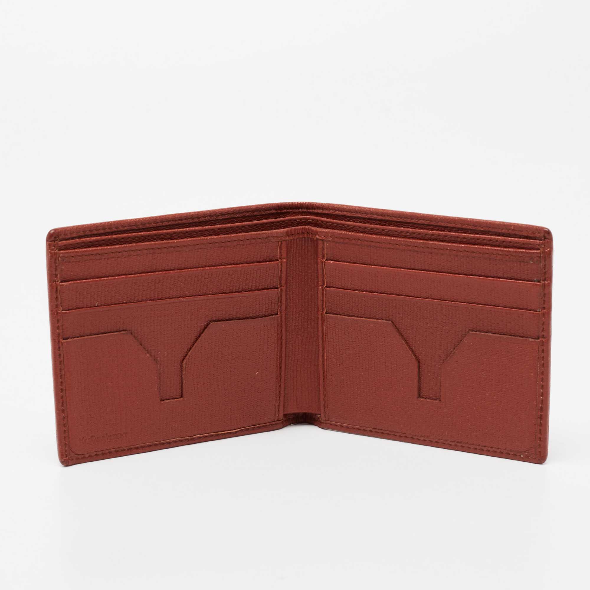 

Yves Saint Laurent Rust Leather Bifold Wallet, Brown