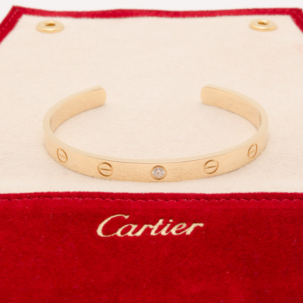 Pre Owned Cartier 18K 'U' Shaped Open Cuff Love Bracelet with Central Diamond