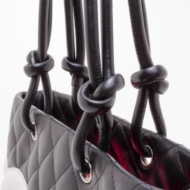 paris-hilton-with-chanel-blacl-cambon-tote-handbag