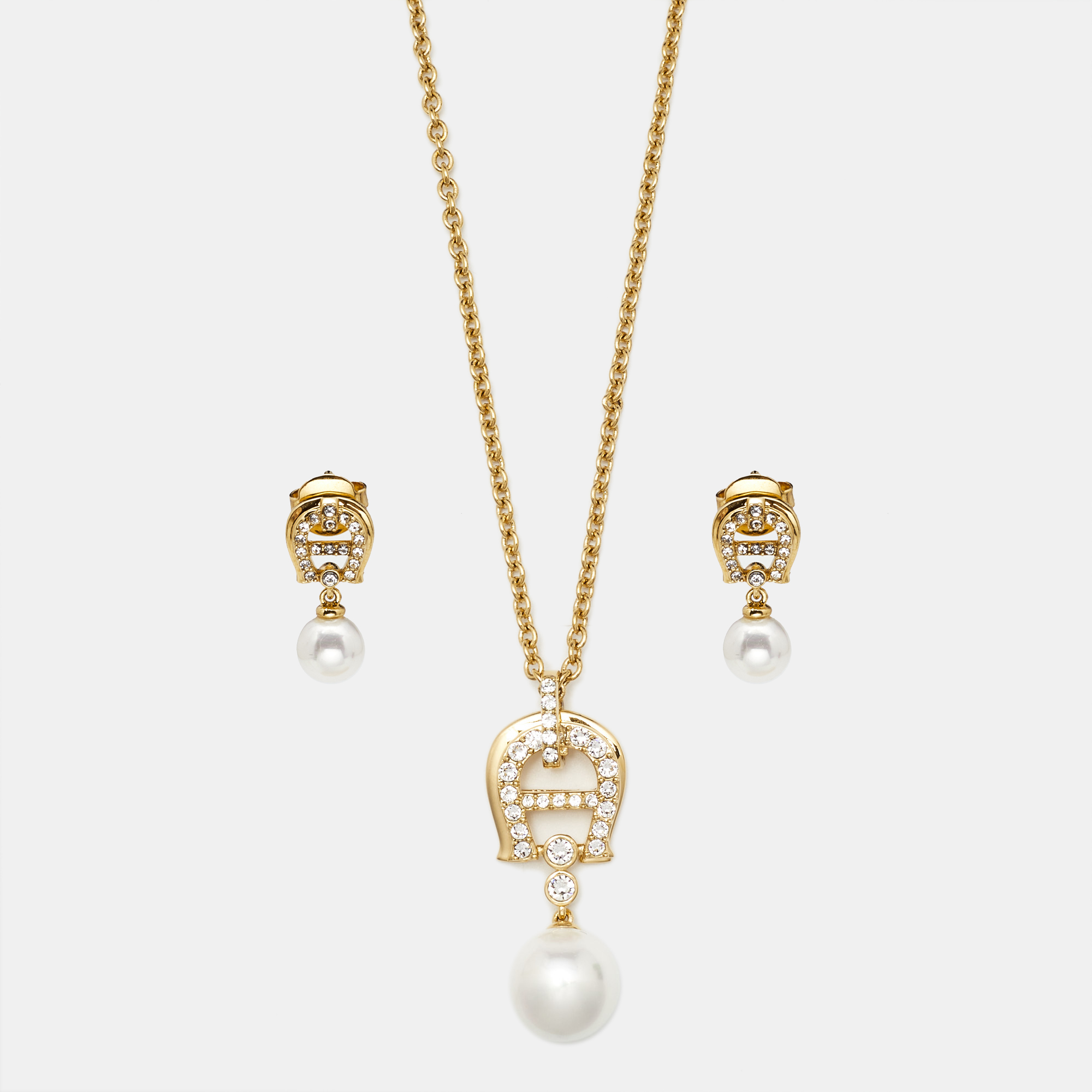 

Aigner Crystal Faux Pearl Gold Tone Necklace & Earrings Set