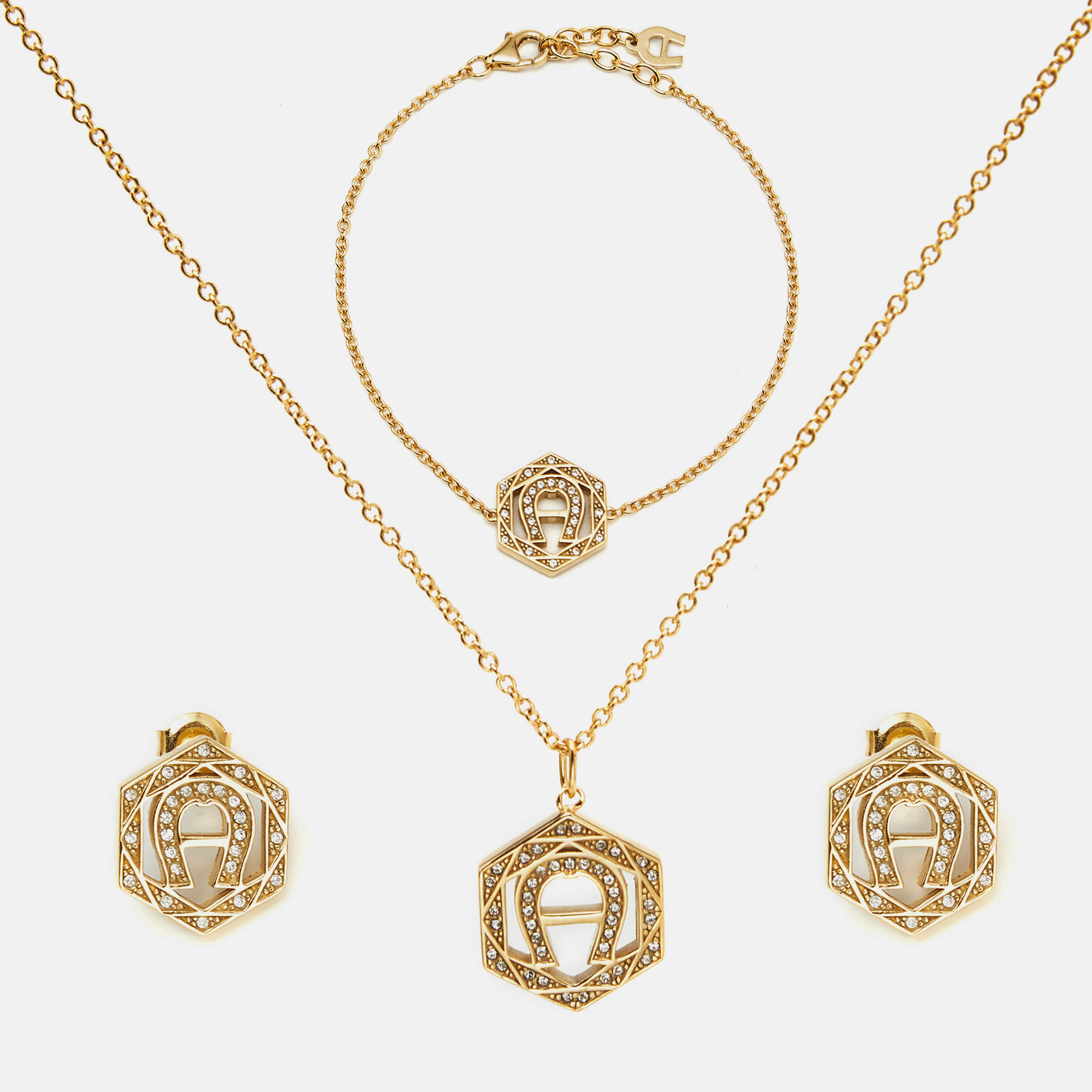 

Aigner Logo Crystals Gold Tone Necklace Bracelet Earrings Set