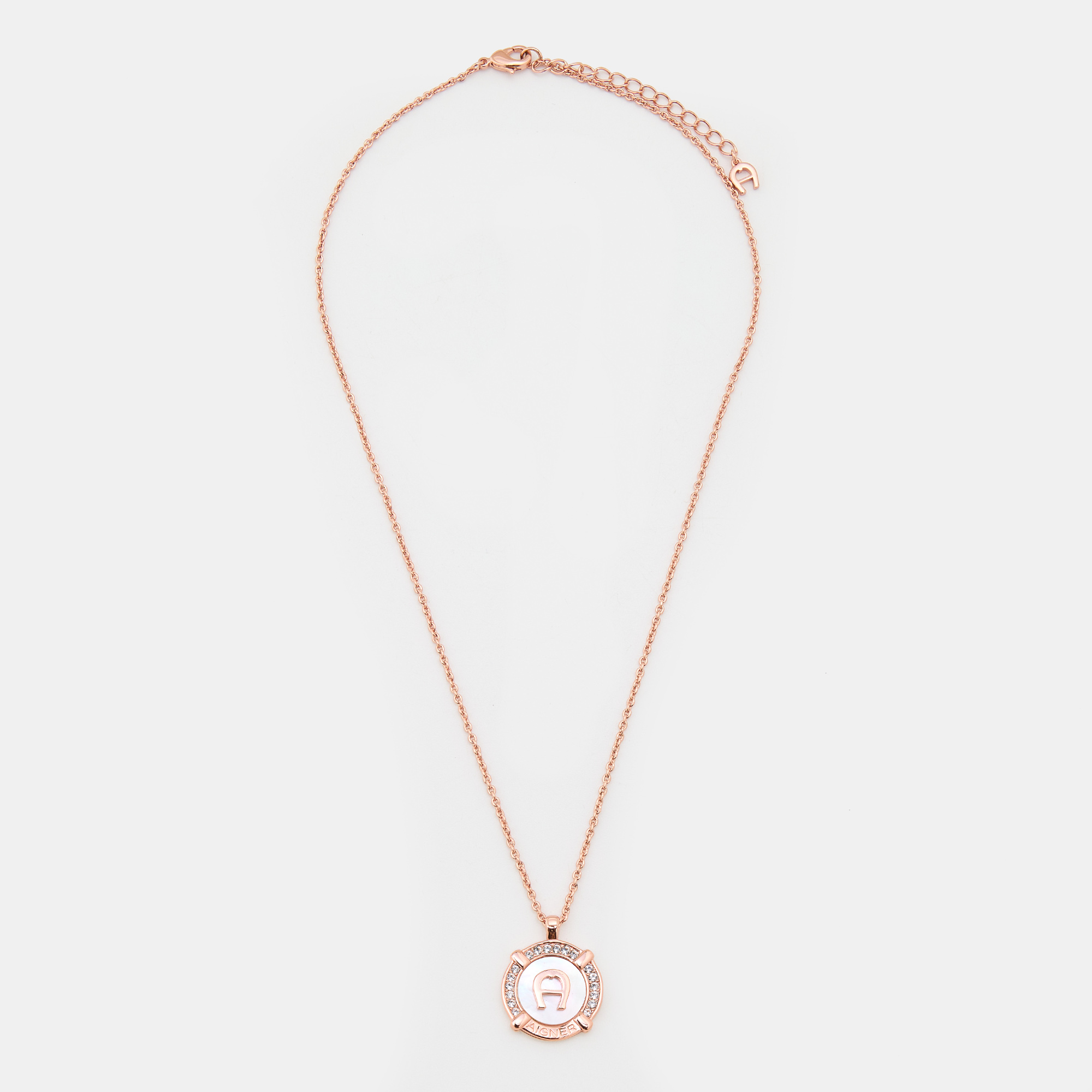 

Aigner Rose Gold Tone Crystal & Mother of Pearl Logo Pendant Necklace