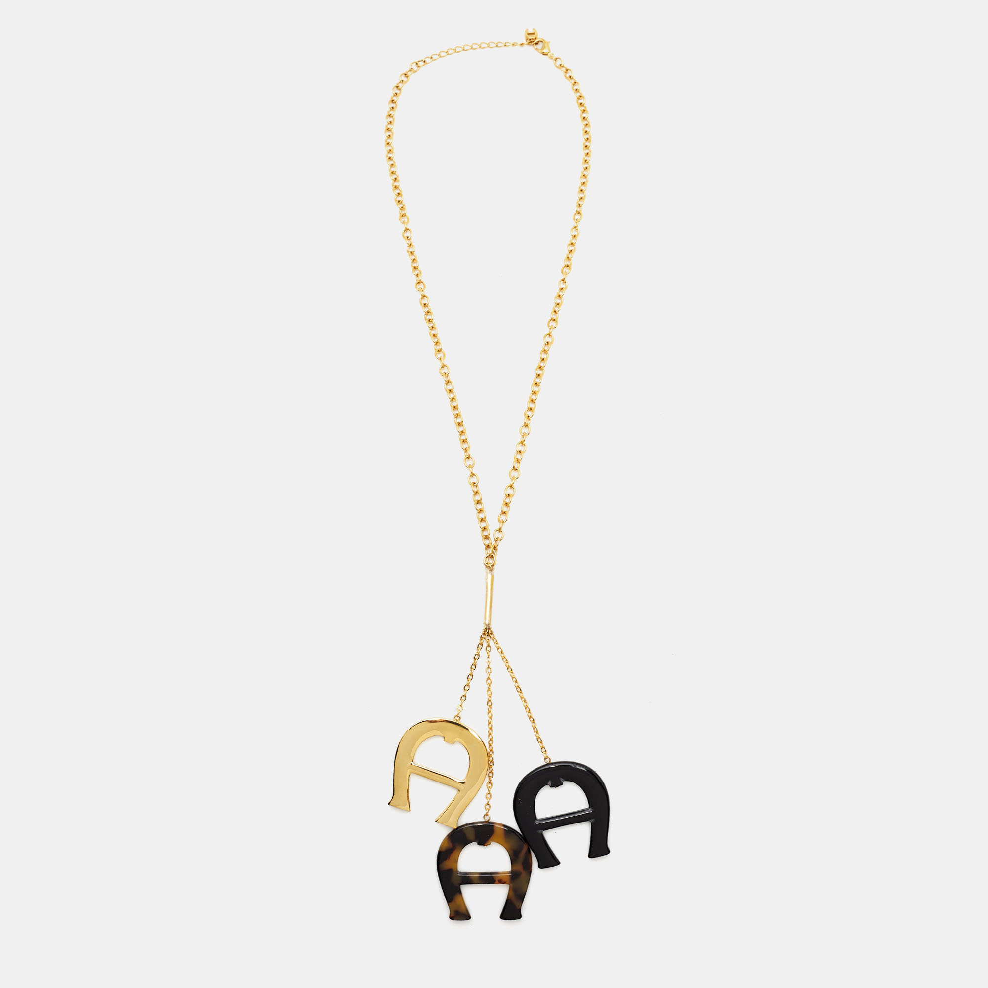 

Aigner Resin Gold Tone 3 Motif Necklace