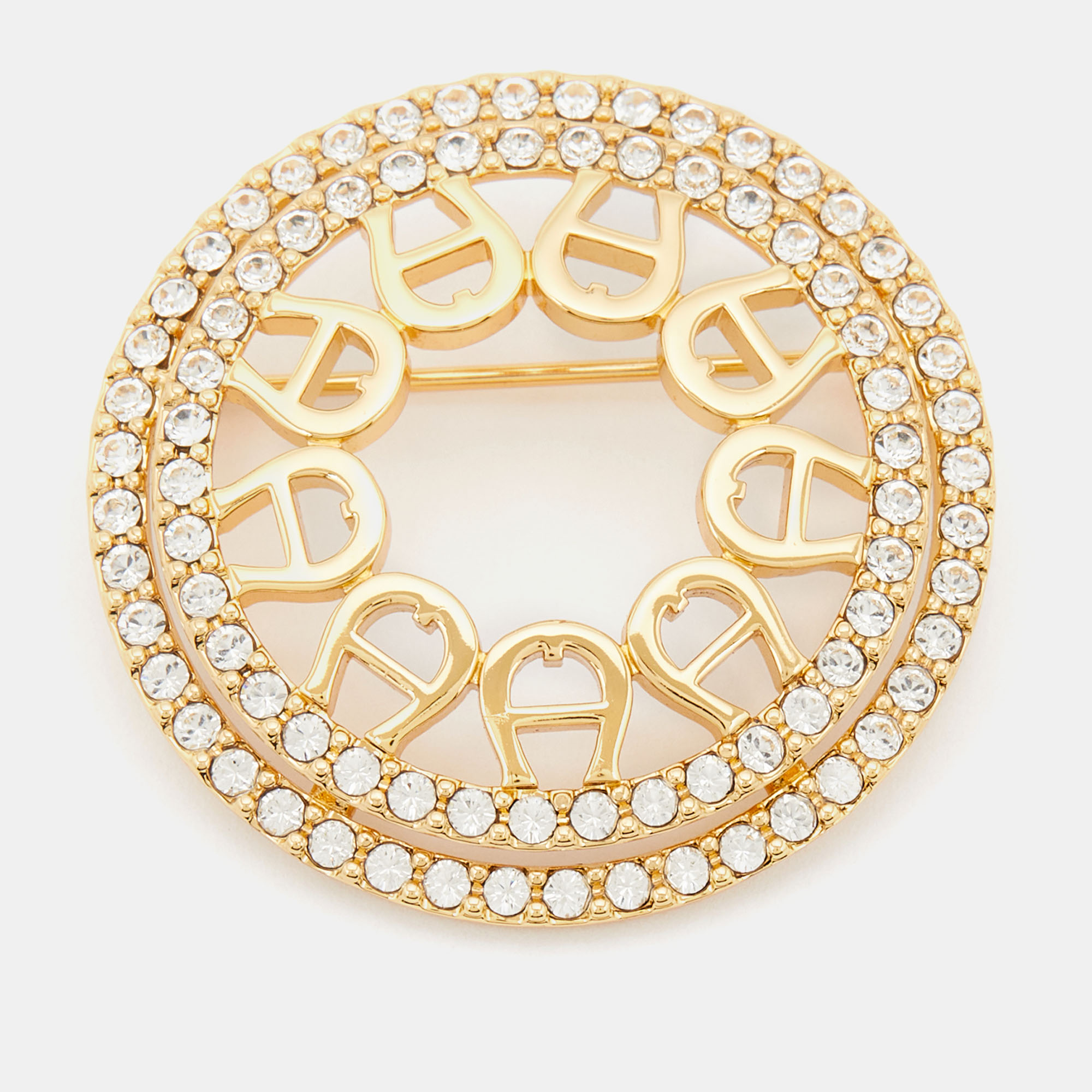 Pre-owned Aigner Gold Tone Crystal Embellished Logo Round Brooch
