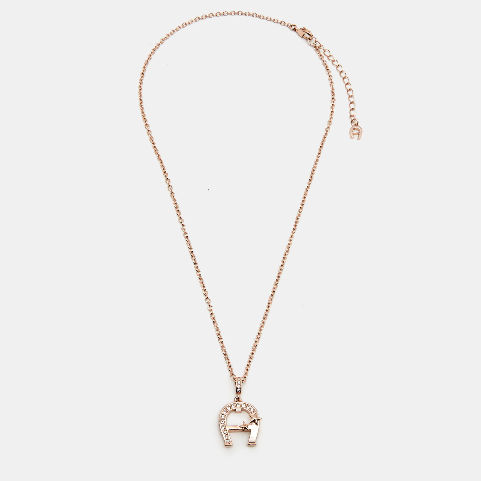 

Aigner Crystal Gold Tone Pendant Necklace