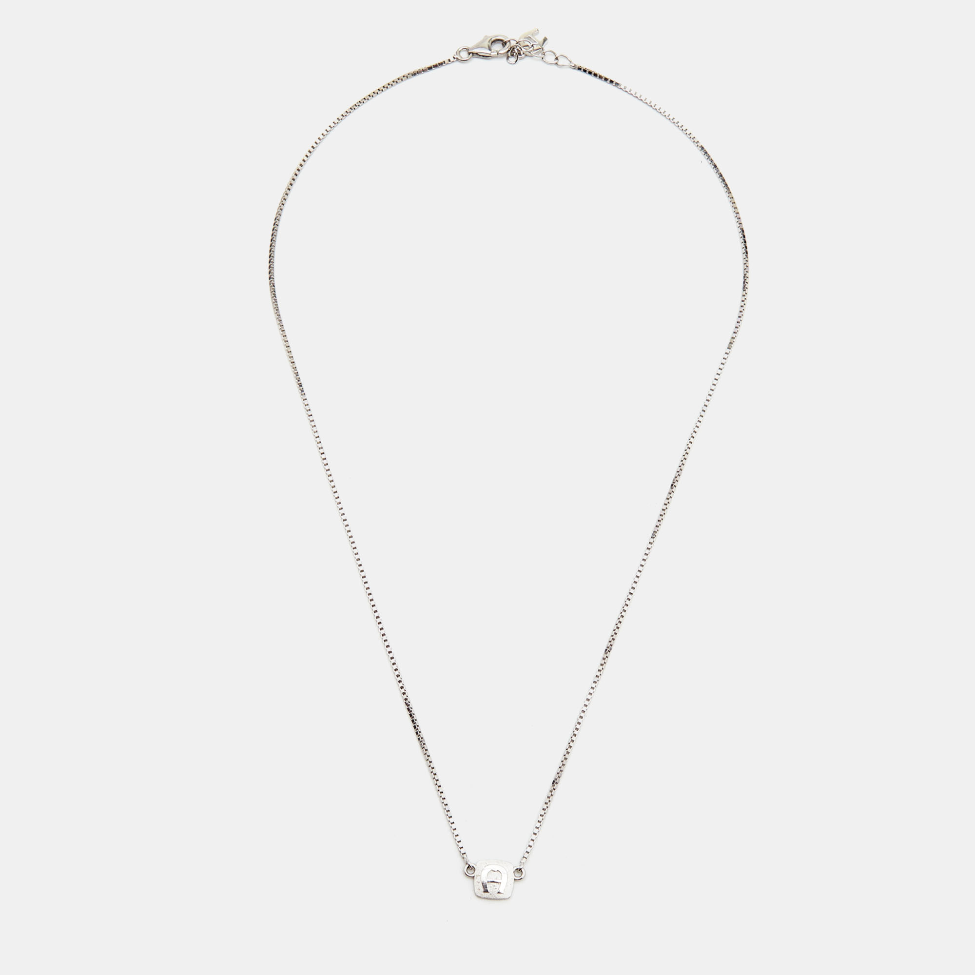 

Aigner Logo Sterling Silver Necklace and Earrings