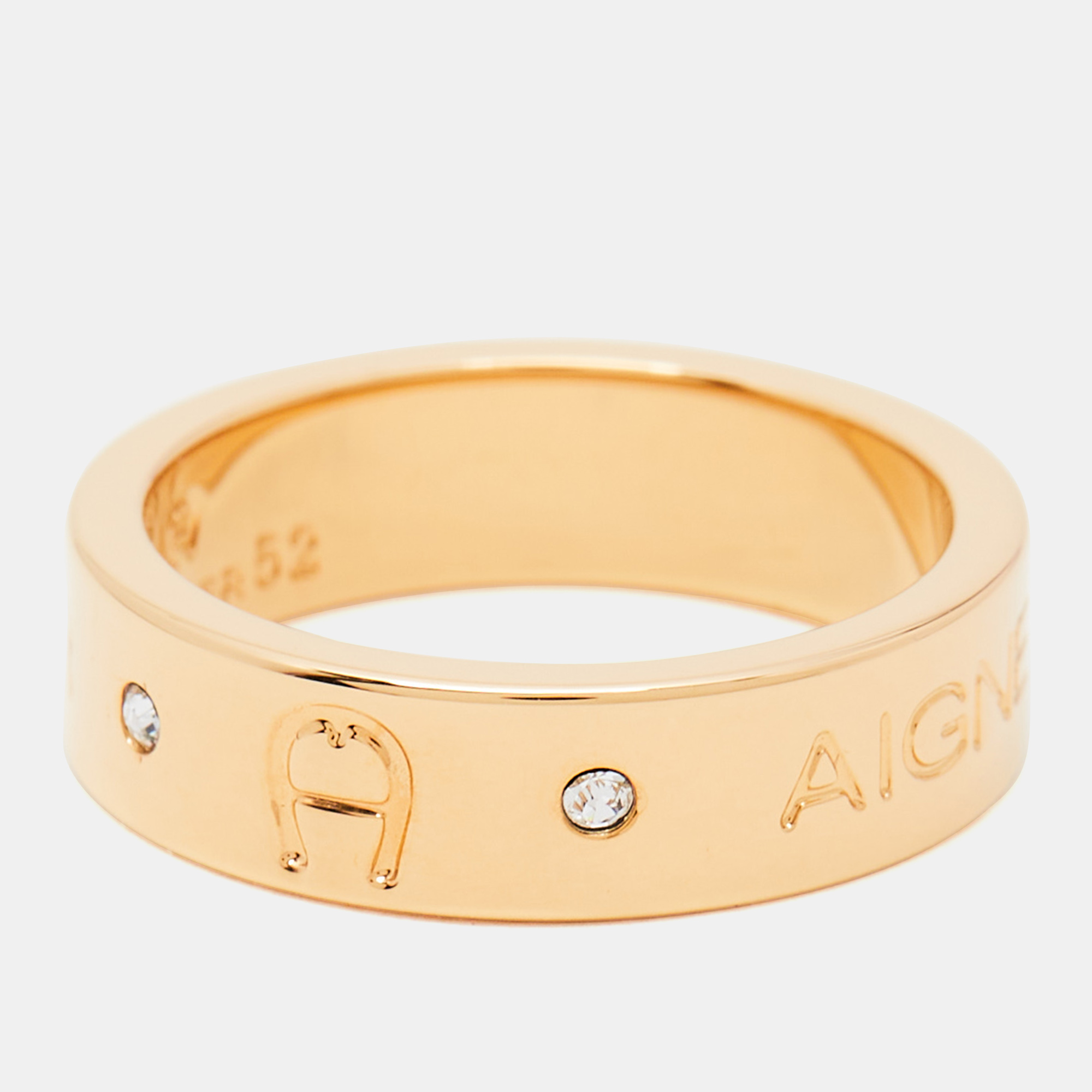

Aigner Gold Plated Crystal Logo Band Ring Size