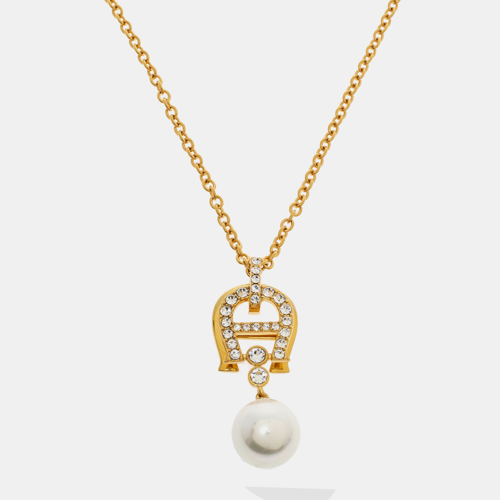 

Aigner Crystal Faux Pearl Gold Tone Long Pendant Necklace