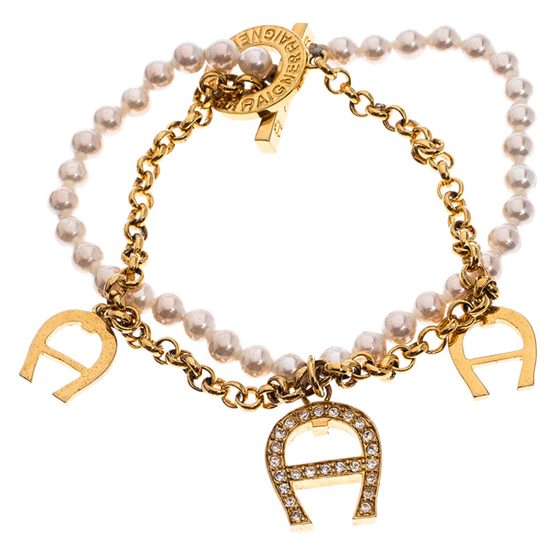 Aigner Crystal Logo Charm and Faux Pearl Gold Plated Layered Bracelet