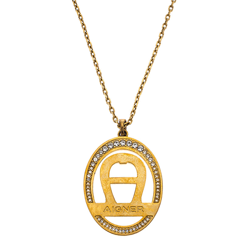 

Aigner Logo Crystal Gold Tone Earring Necklace Set