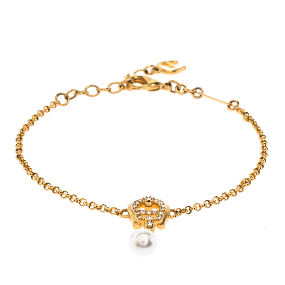 

Aigner Crystal Faux Pearl Gold Tone Charm Bracelet