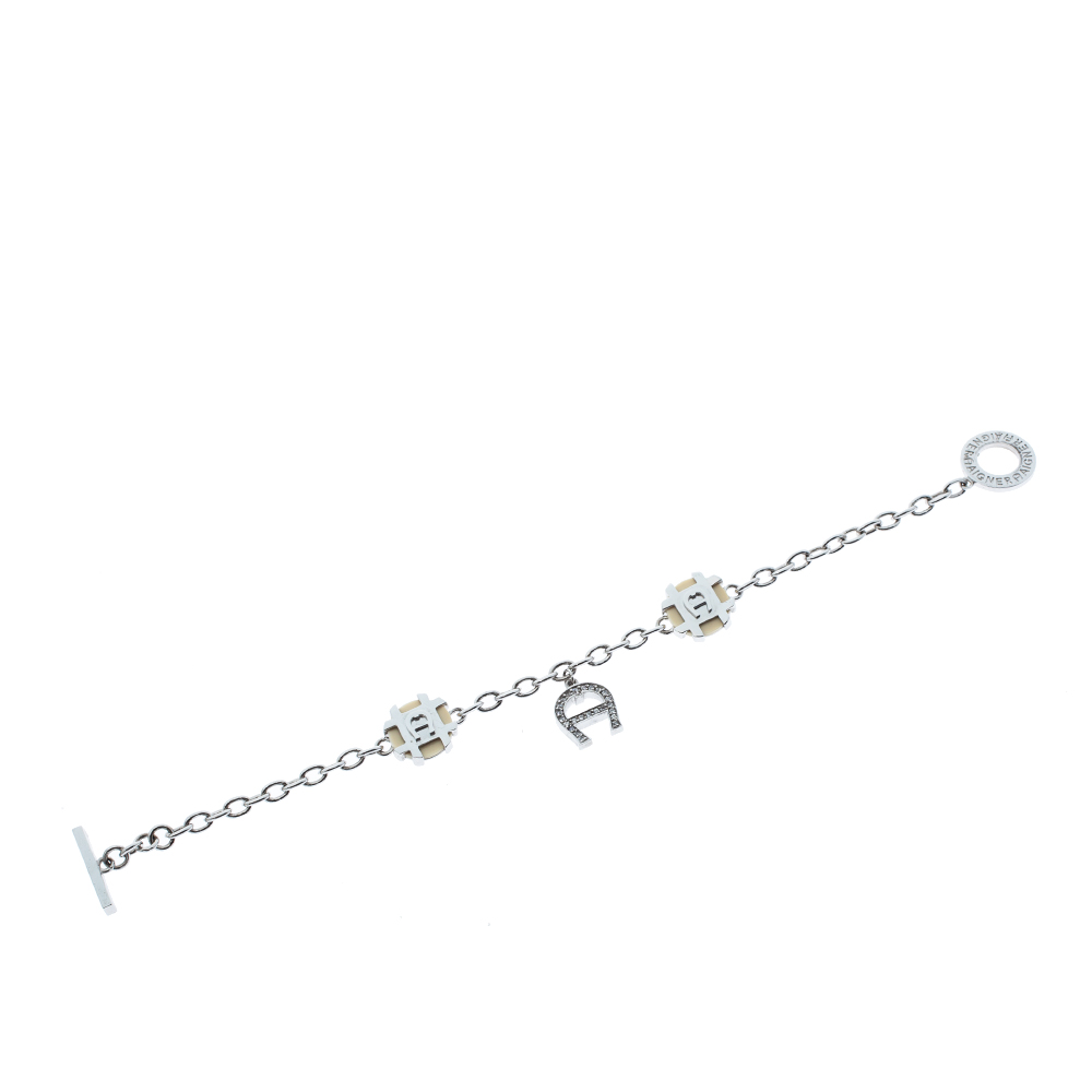 

Aigner Crystal Resin Logo Charm Silver Tone Toggle Bracelet