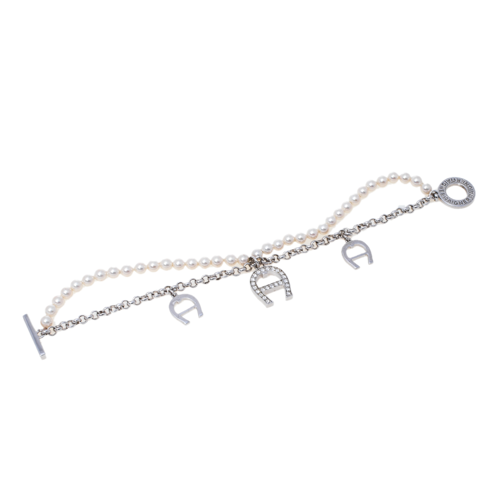 

Aigner Faux Pearl Crystal Silver Tone Double Strand Toggle Bracelet