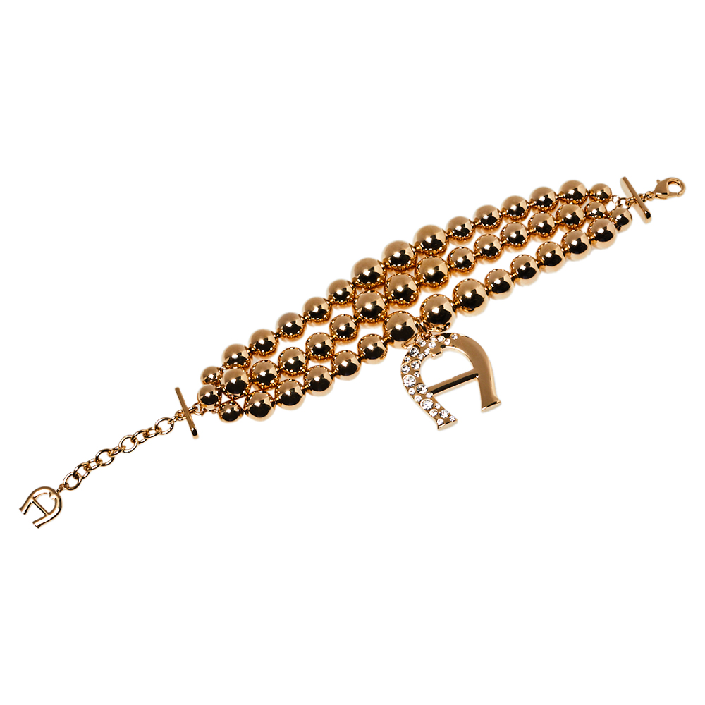 

Aigner Gold Tone Layered Bracelet and Logo Drop Earrings Set