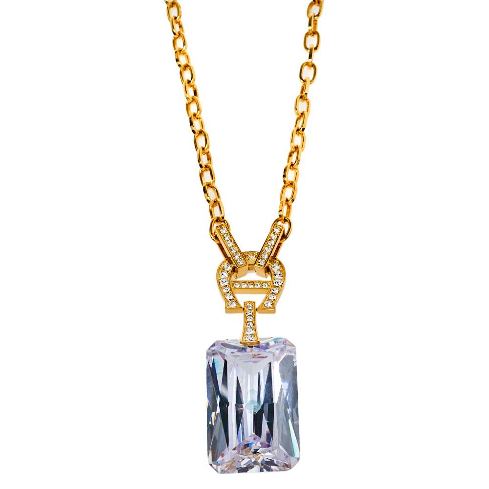 Click to view more detailed imagery on our partner's website Pre-owned Aigner Gold Tone Large Crystal Pendant Necklace