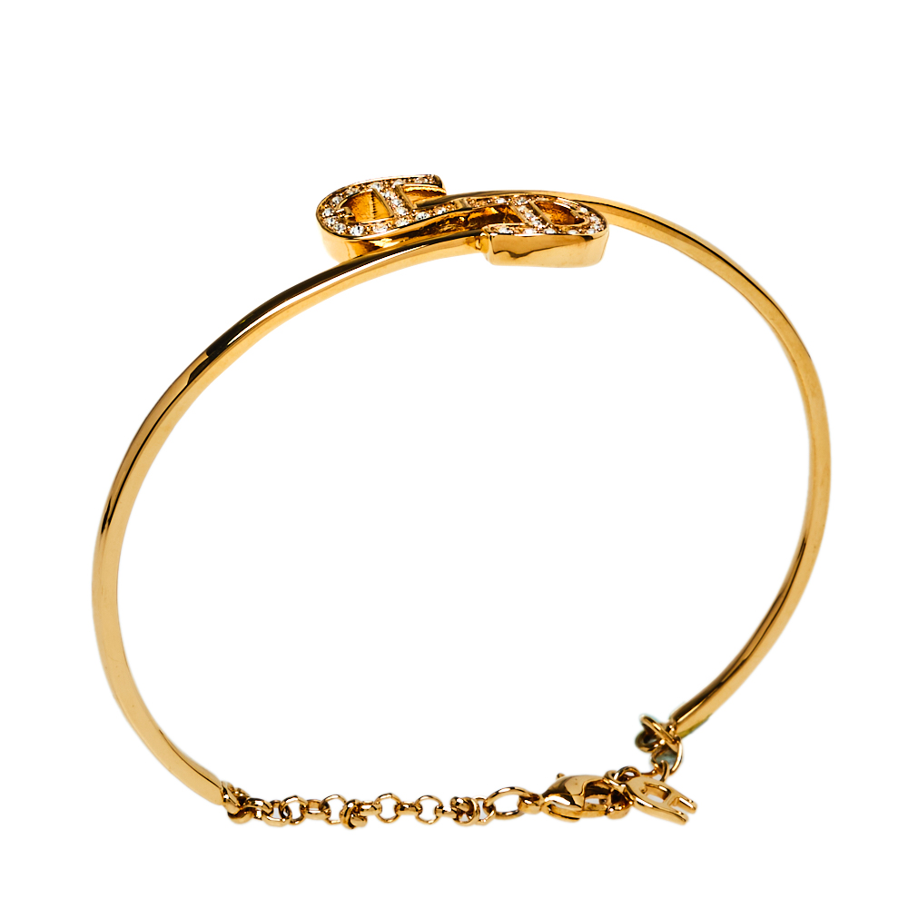 

Aigner Crystal Logo Charm Gold Tone Bracelet