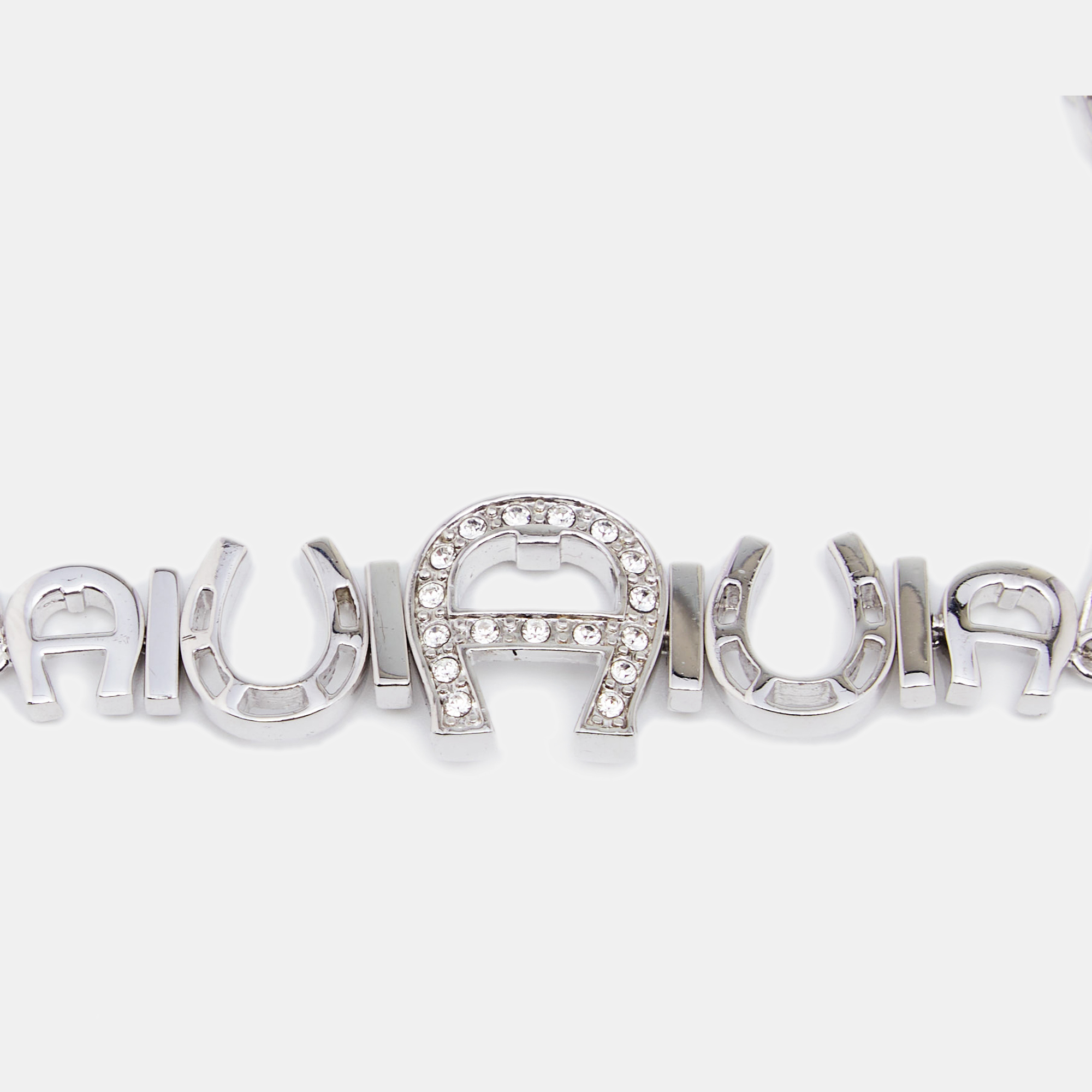 

Aigner Silver Tone Crystal Logo & Horseshoe Bracelet