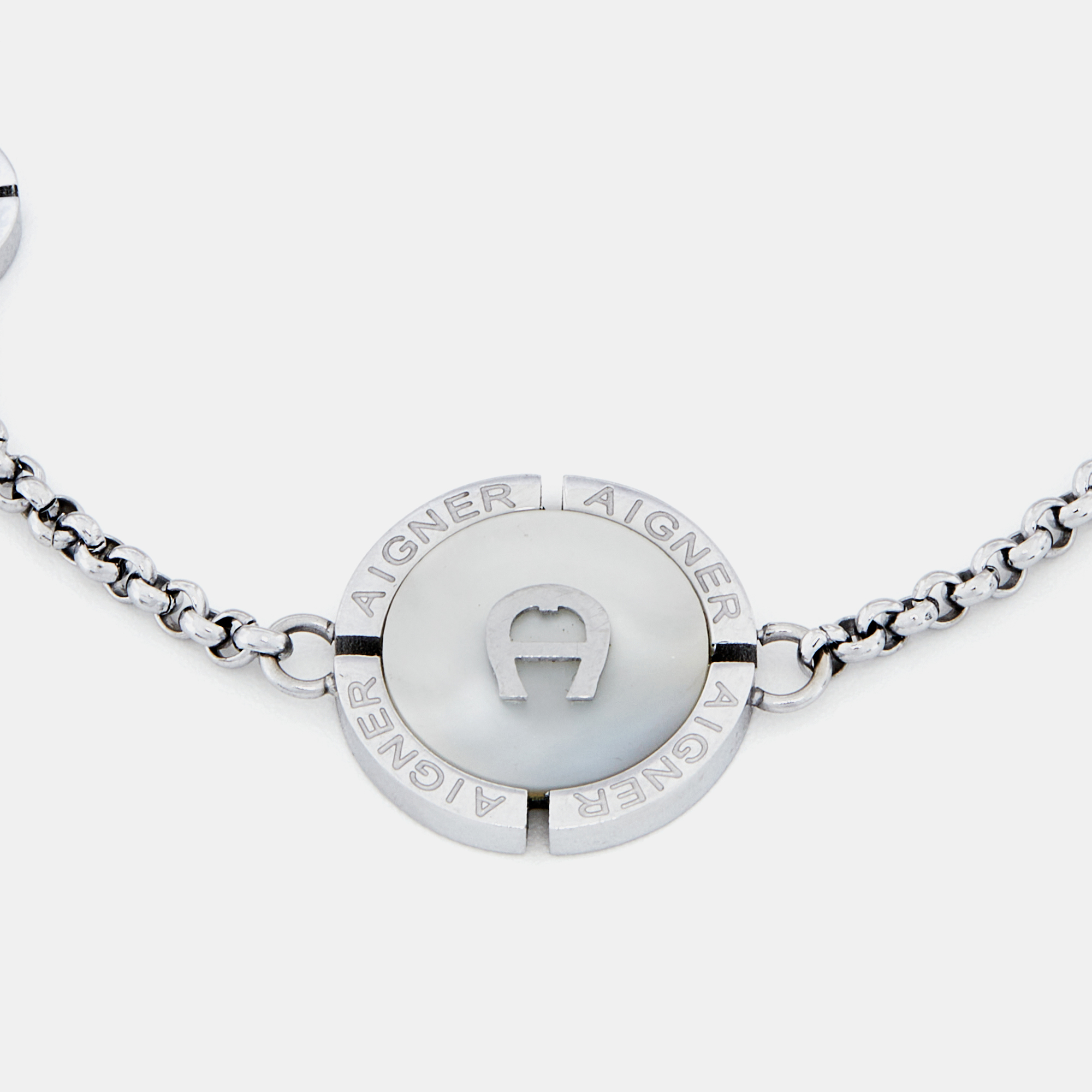 

Aigner Silver Tone Mother of Pearl Logo Bracelet