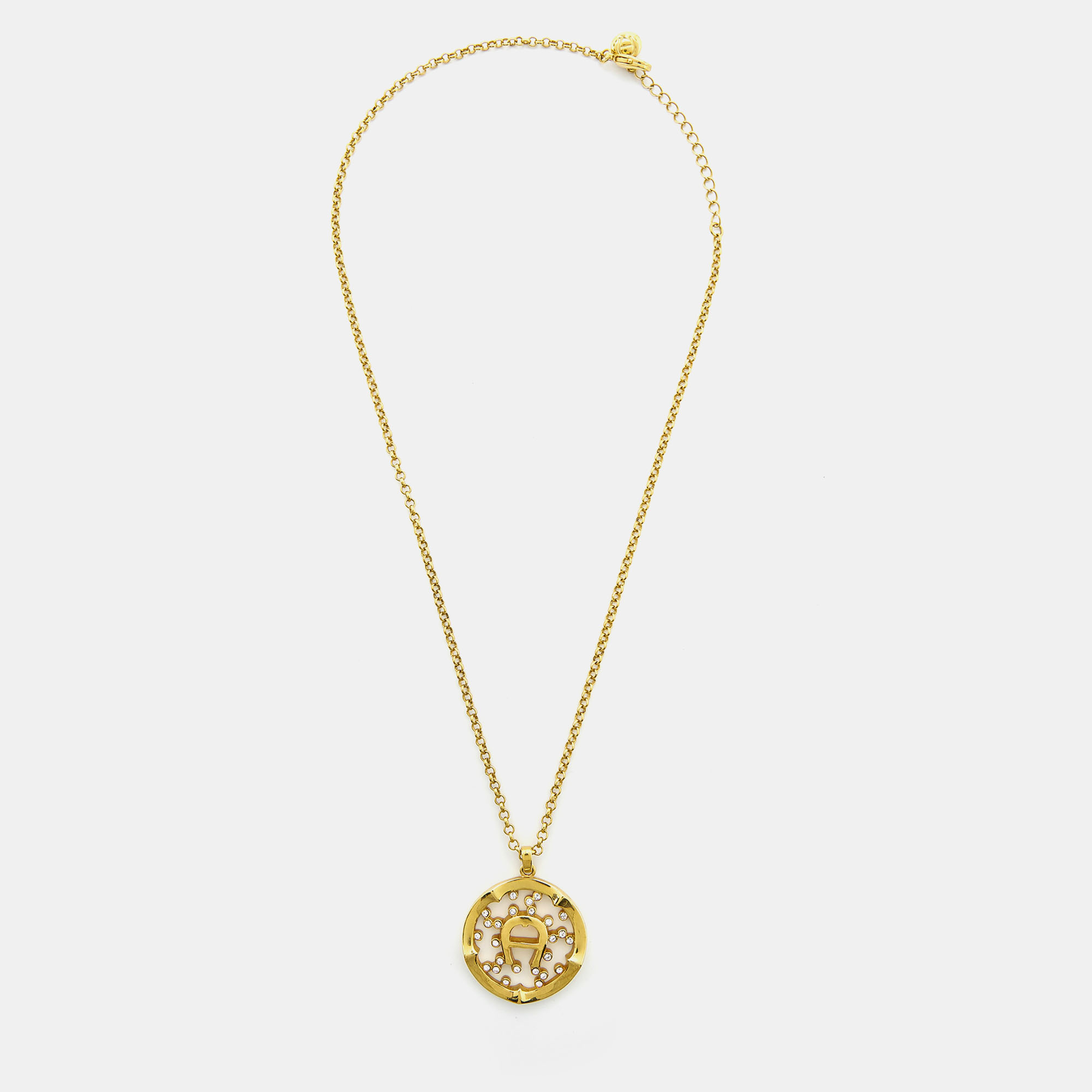 

Aigner Gold Tone Crystal Embedded Logo Pendant Necklace & Earrings Set