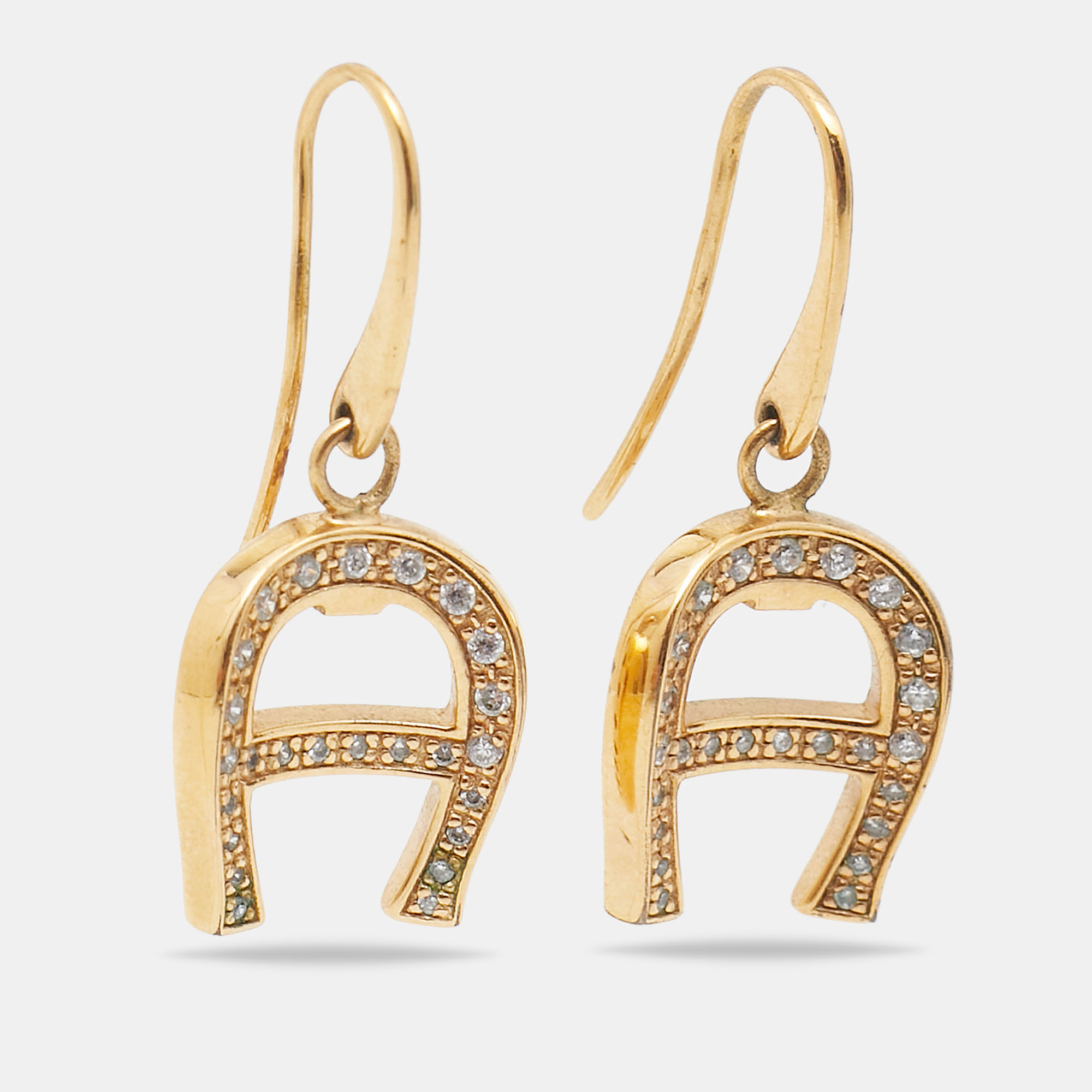 

Aigner Crystal Gold Tone Earrings