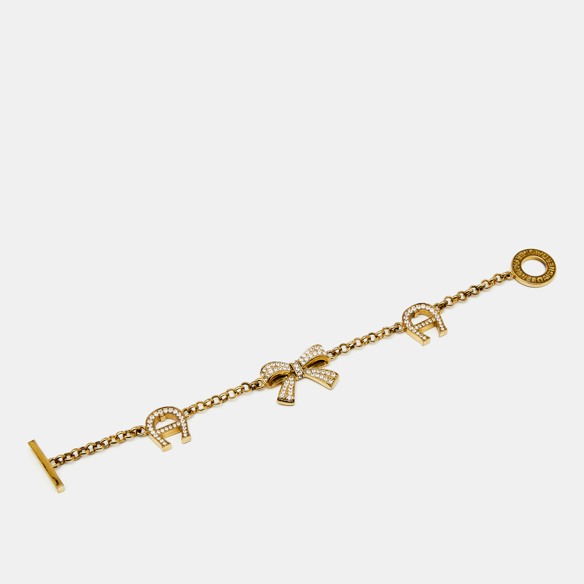 

Aigner Bow Crystals Gold Tone Bracelet, Silver