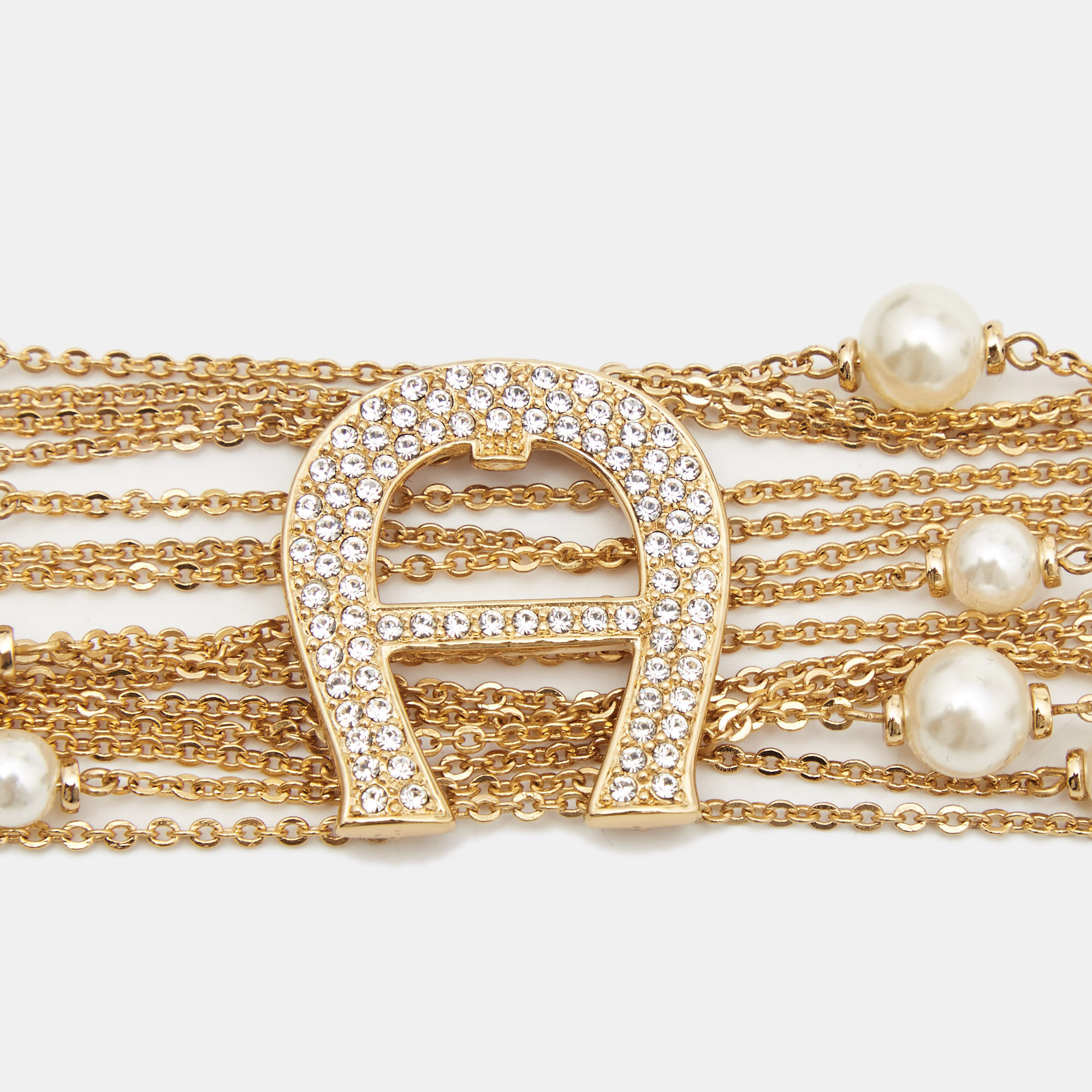 

Aigner Capri Faux Pearl & Crystal Logo Gold Tone Bracelet