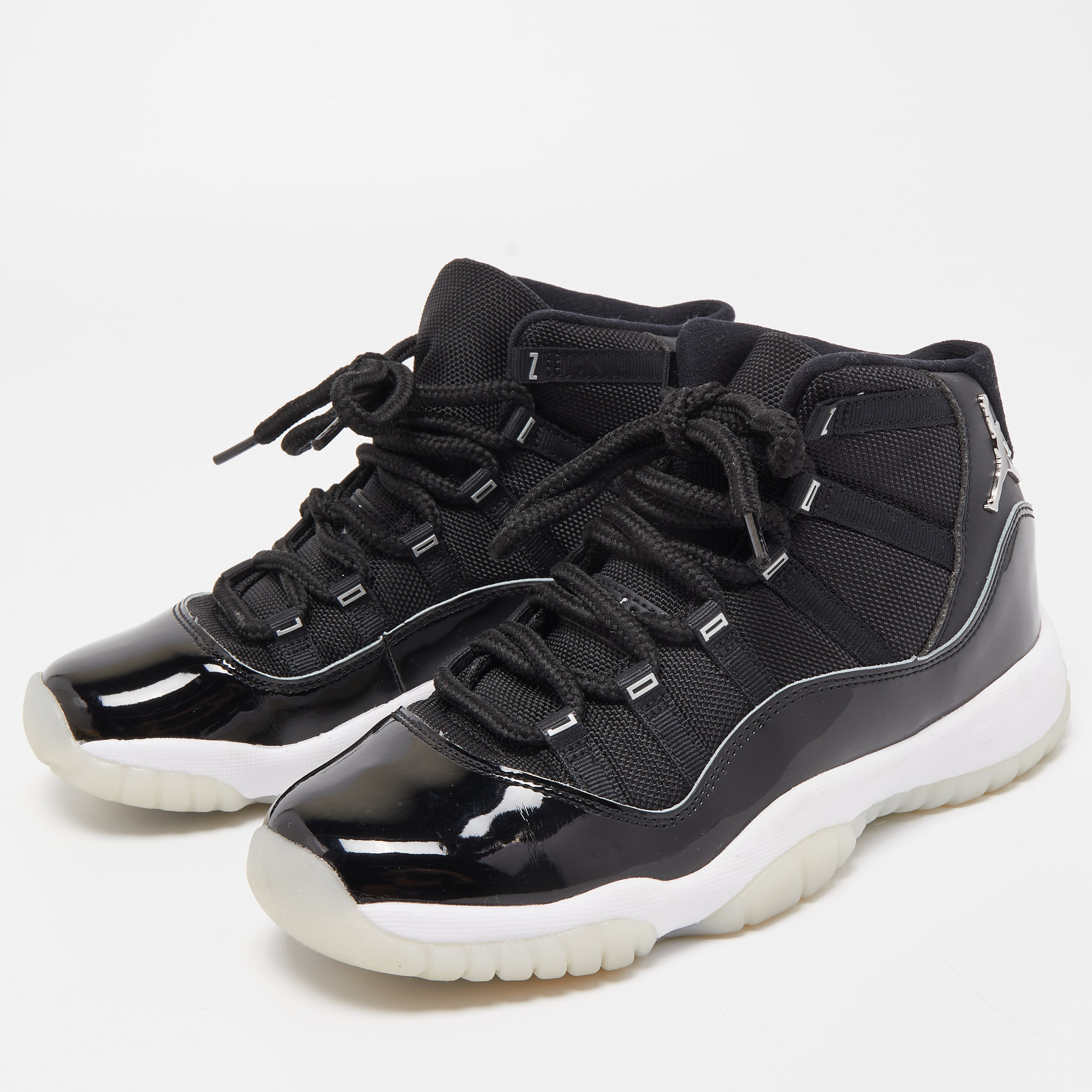 

Air Jordans Black Mesh and Leather Jordan 11 Retro Jubilee Sneakers Size