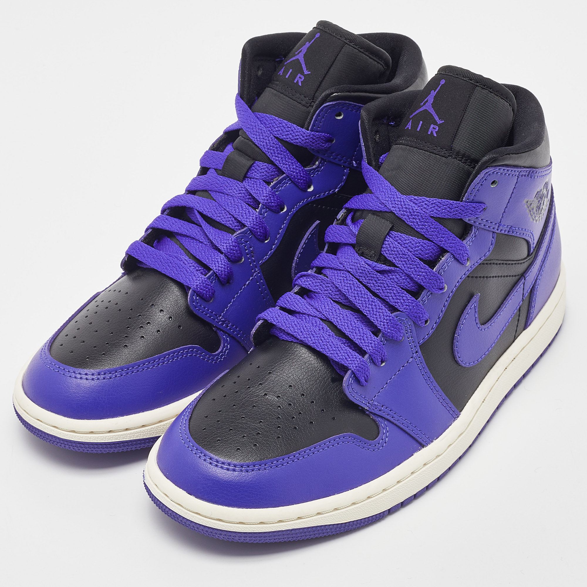 

Air Jordans Purple/Black Leather Air Jordan 1 Mid Sneakers Size