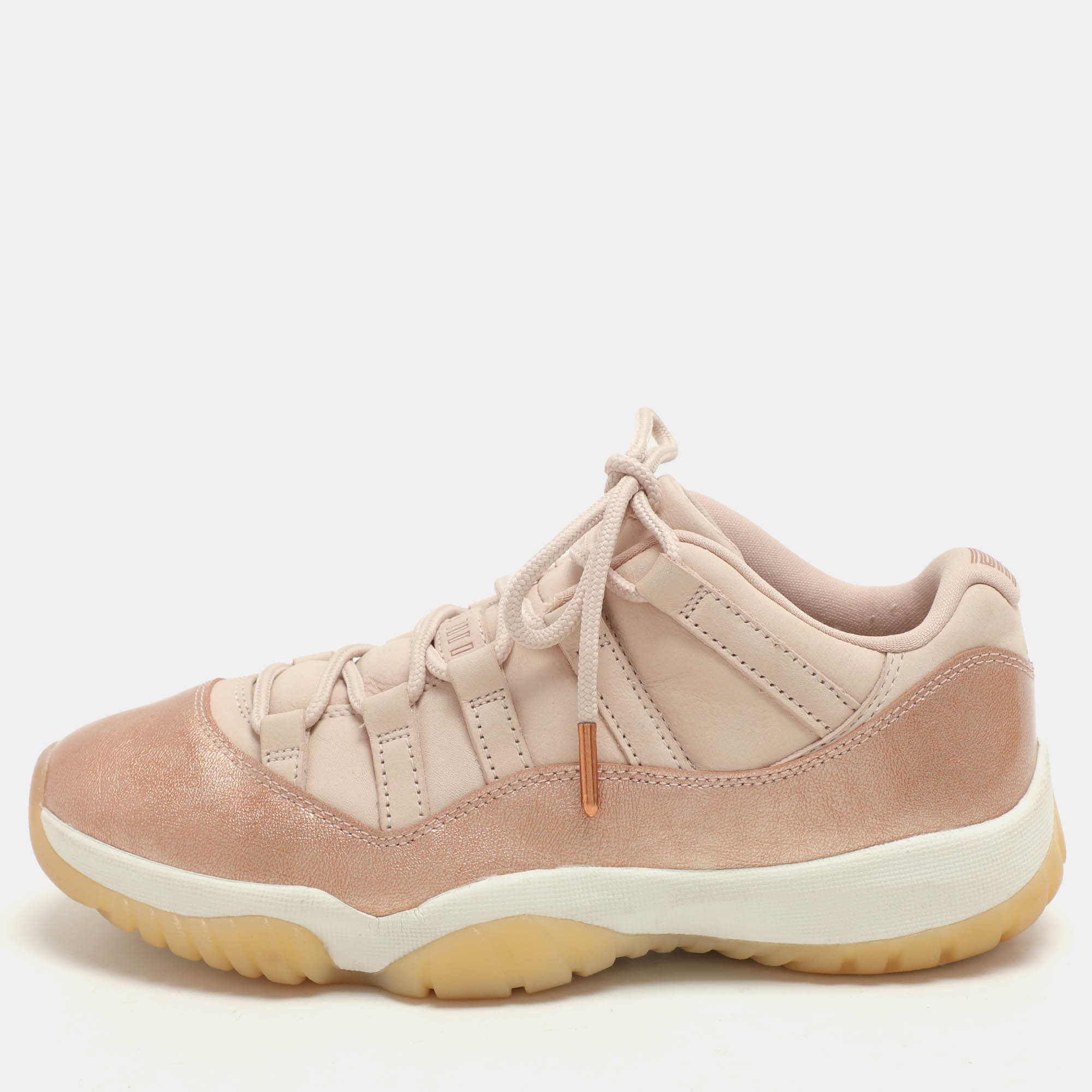 

Air Jordans Beige/Rose Gold Patent and Leather Jordan 11 Low Top Sneakers Size 39