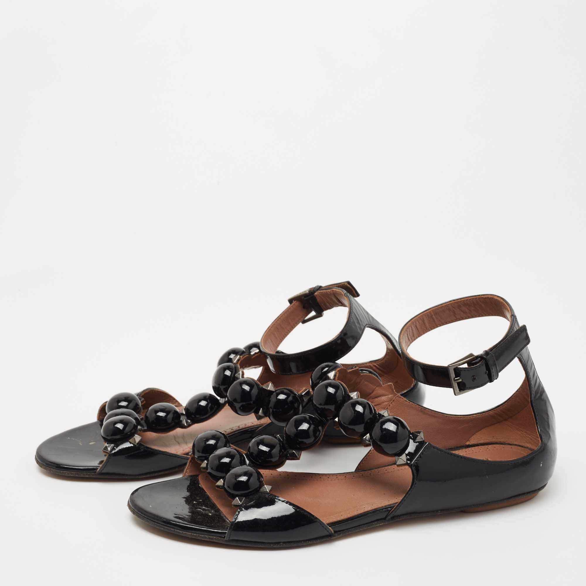 

Alaia Black Patent Leather Bombe Flat Ankle Strap Sandals Size
