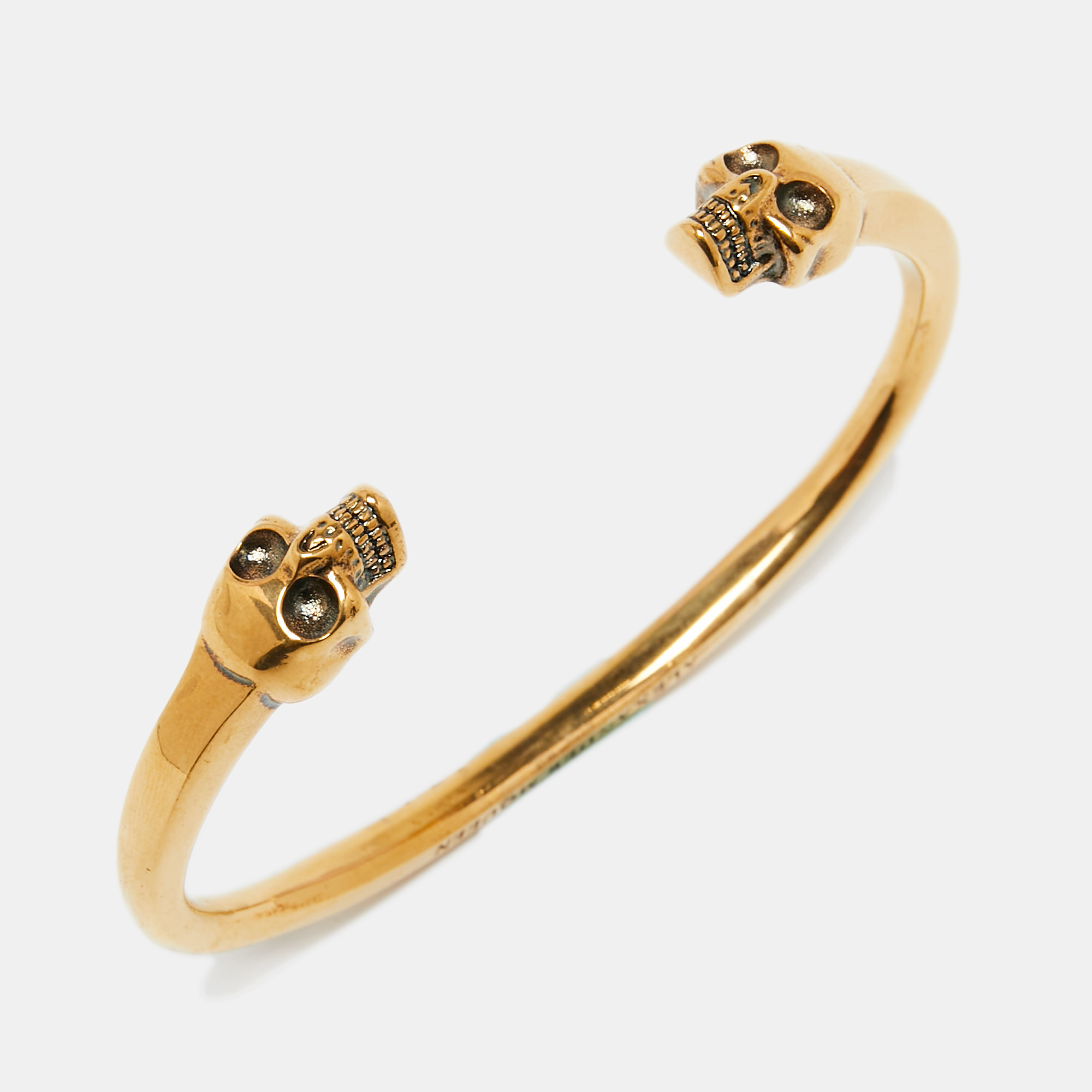 

Alexander McQueen Gold Tone Skull Cuff Bracelet