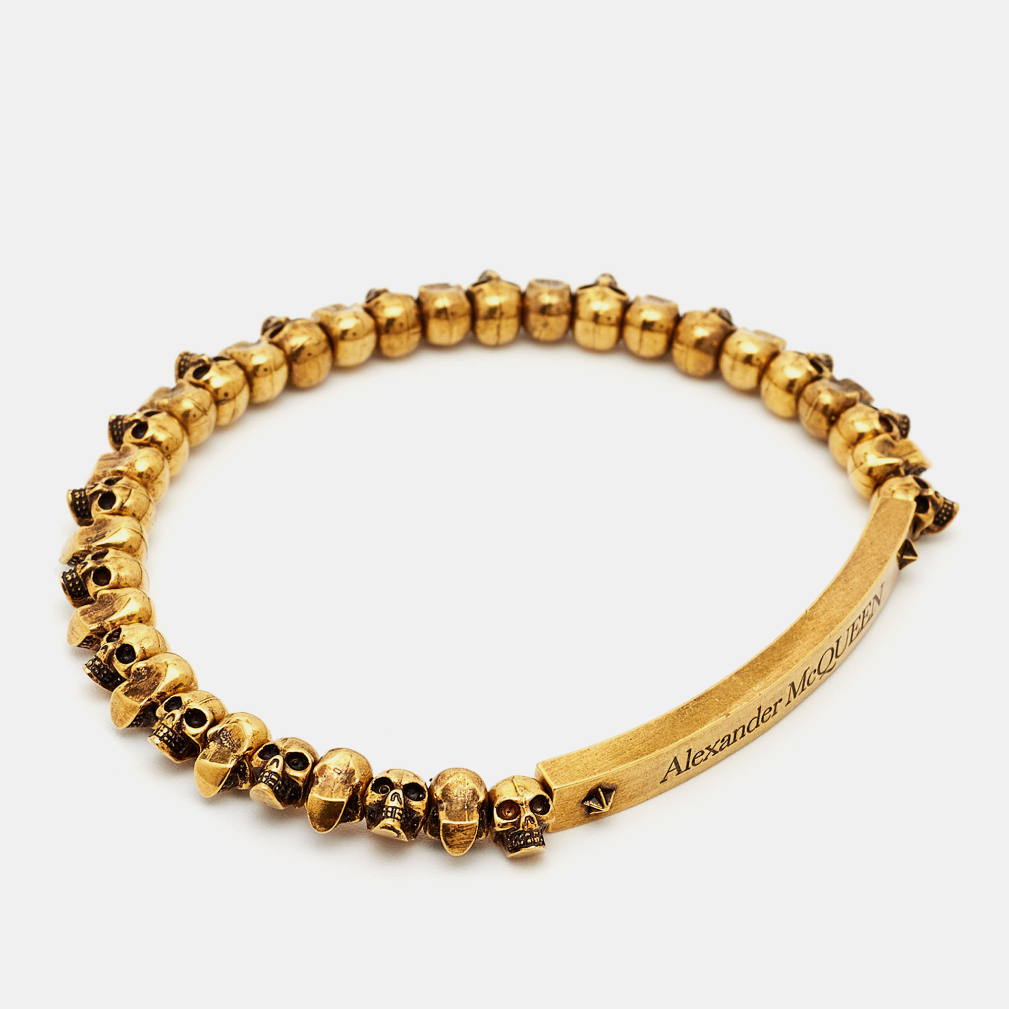 

Alexander McQueen Skull Gold Tone Stretchable Bracelet