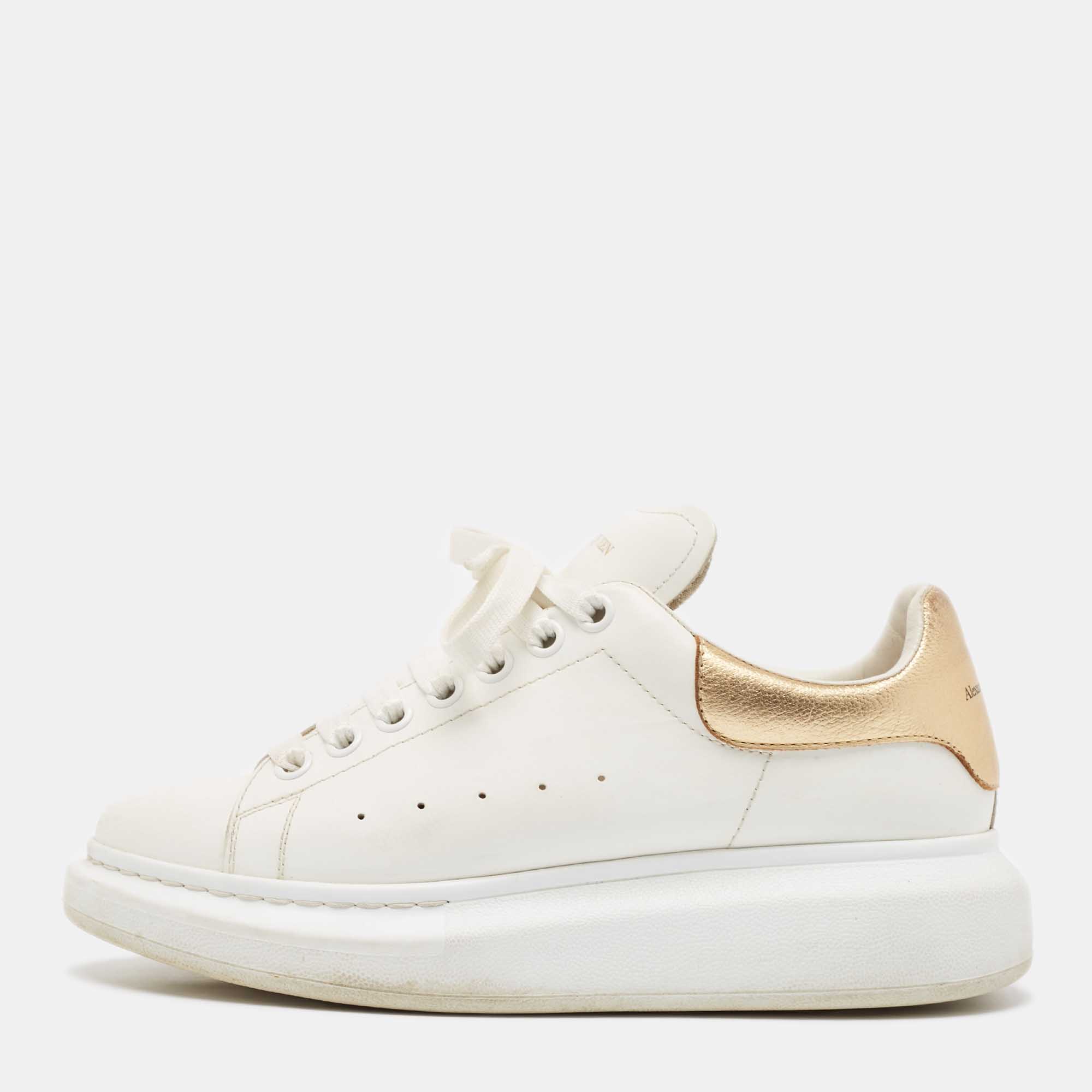 

Alexander McQueen White/Gold Leather Oversized Sneakers Size