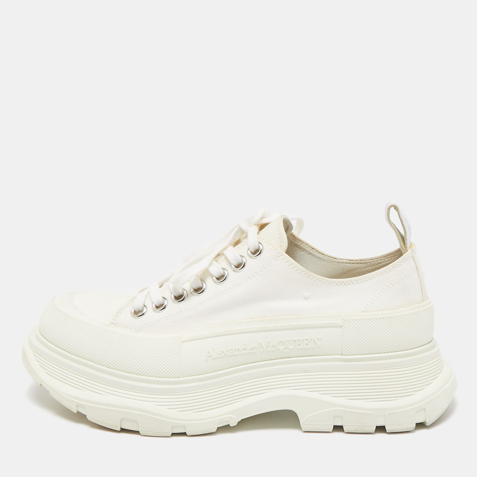 

Alexander McQueen White Canvas and Rubber Tread Slick Lace Up Sneakers