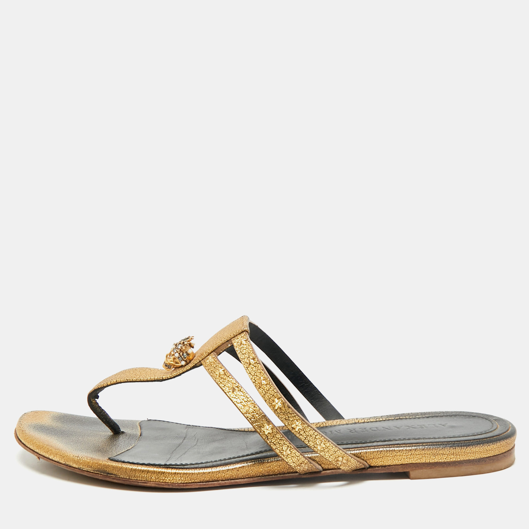 

Alexander McQueen Gold Leather Embellished Skull Thong Flats Size