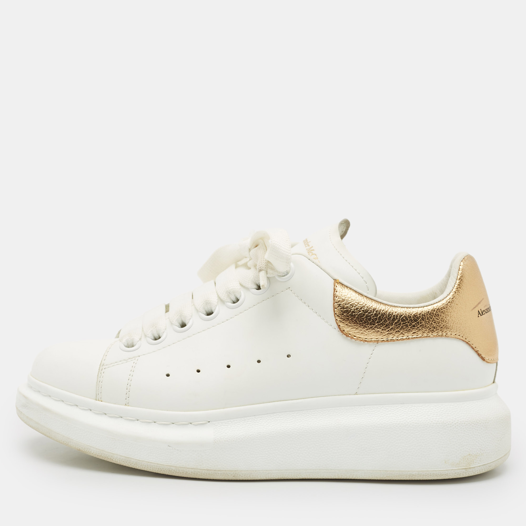 

Alexander McQueen White/Gold Leather Oversized Sneakers Size