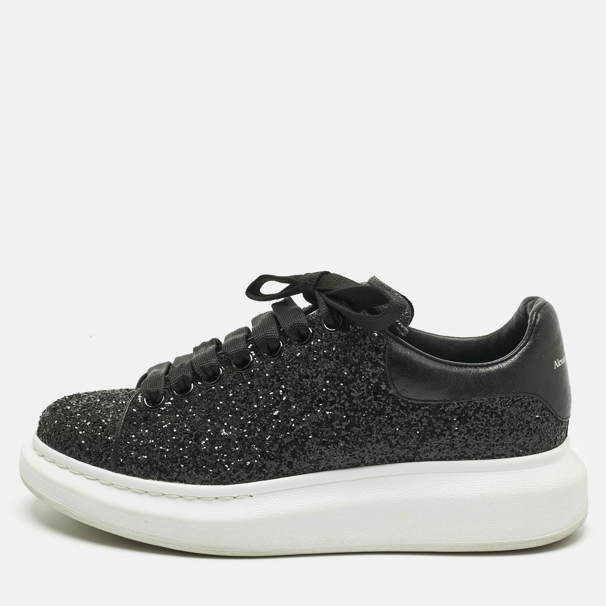 

Alexander McQueen Black Glitter and Leather Oversized Sneakers Size