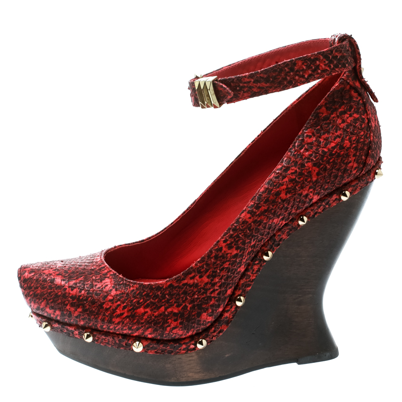 

Alexander McQueen Red Embossed Snakeskin Leather Ankle Strap Spike Studded Wedge Pumps Size