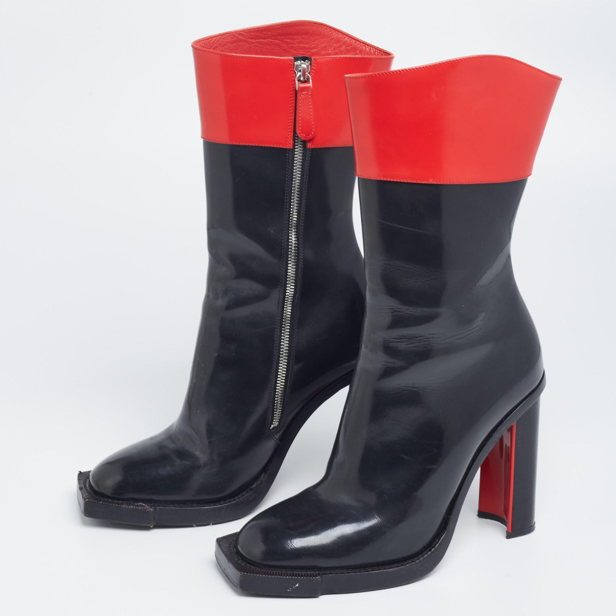 

Alexander McQueen Red/Black Patent Leather Calf Length Boots Size