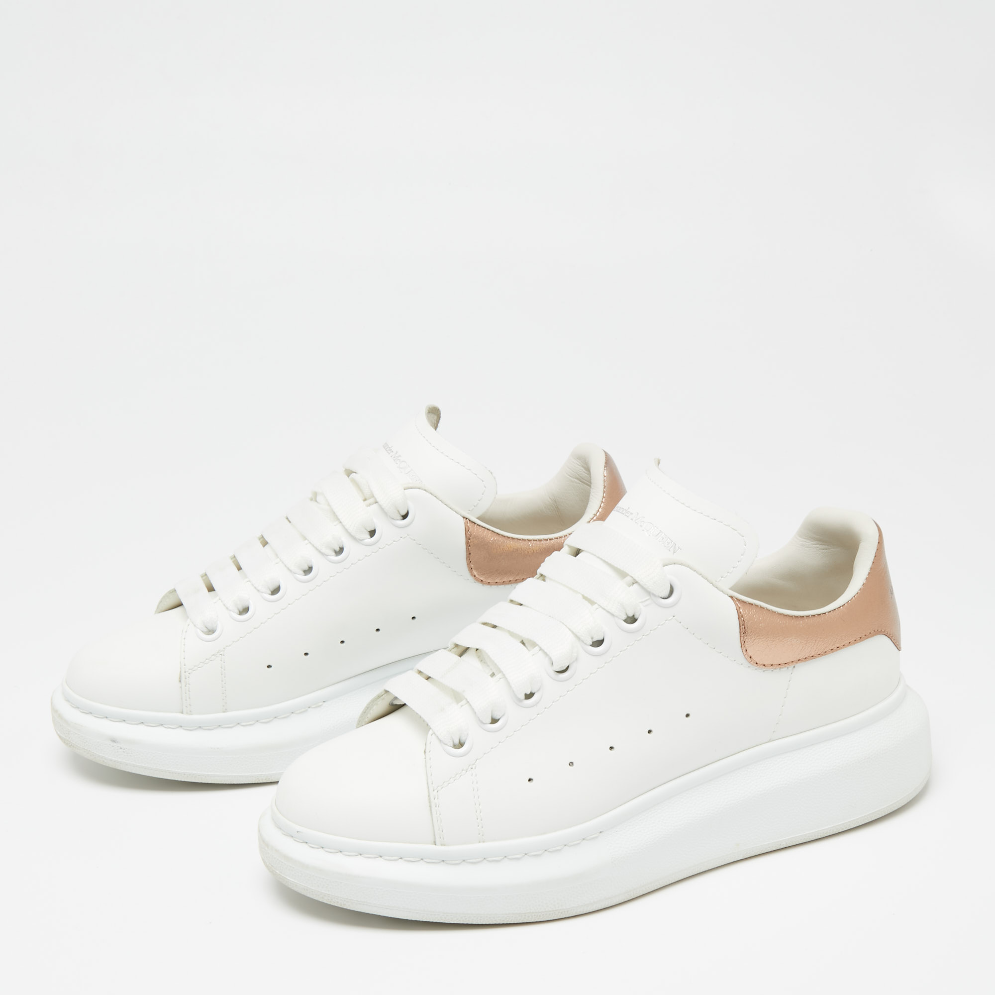 

Alexander McQueen White/Gold Leather Oversized Sneakers Size