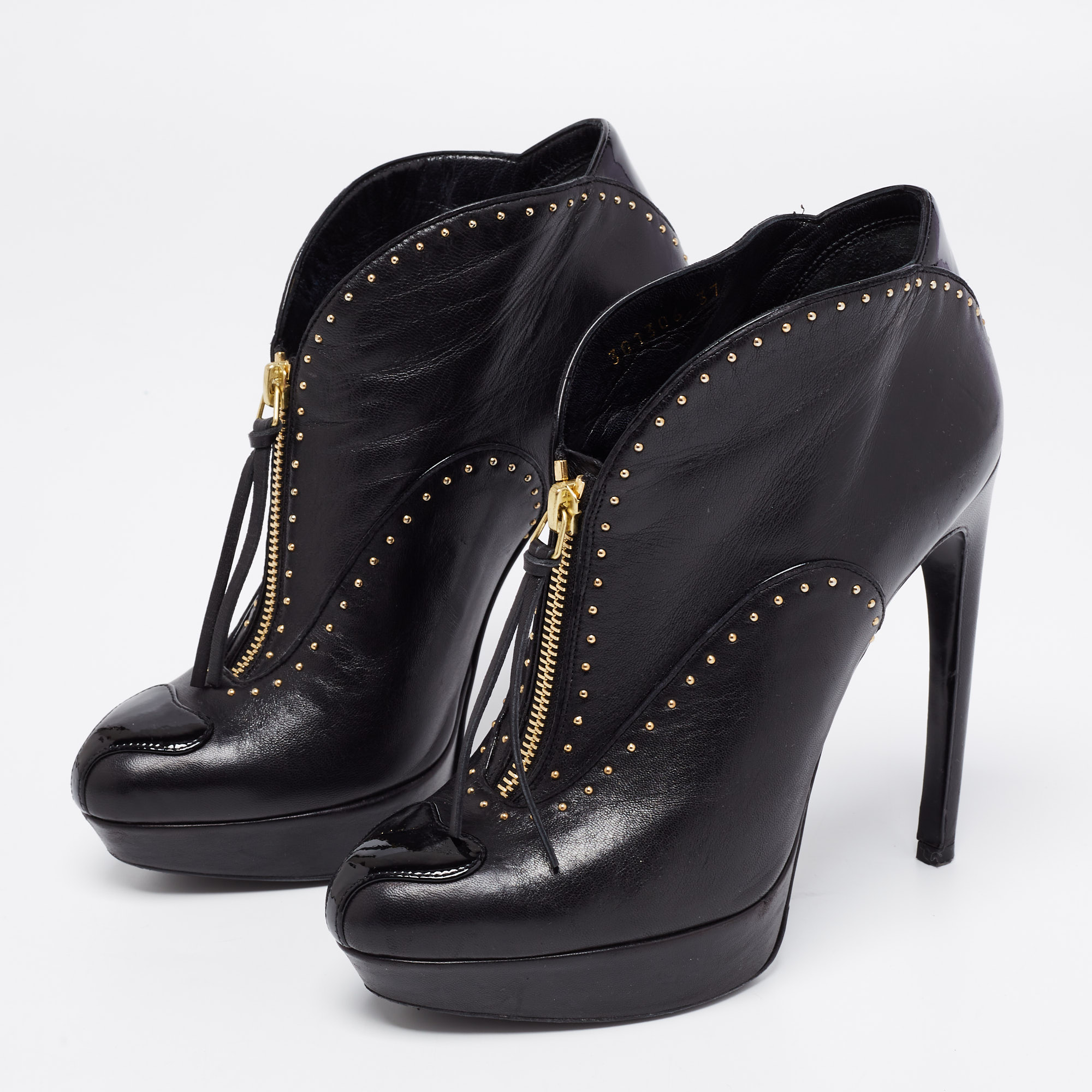 

Alexander McQueen Black Patent And Leather Studded Front Zip Up Ankle Boots Size